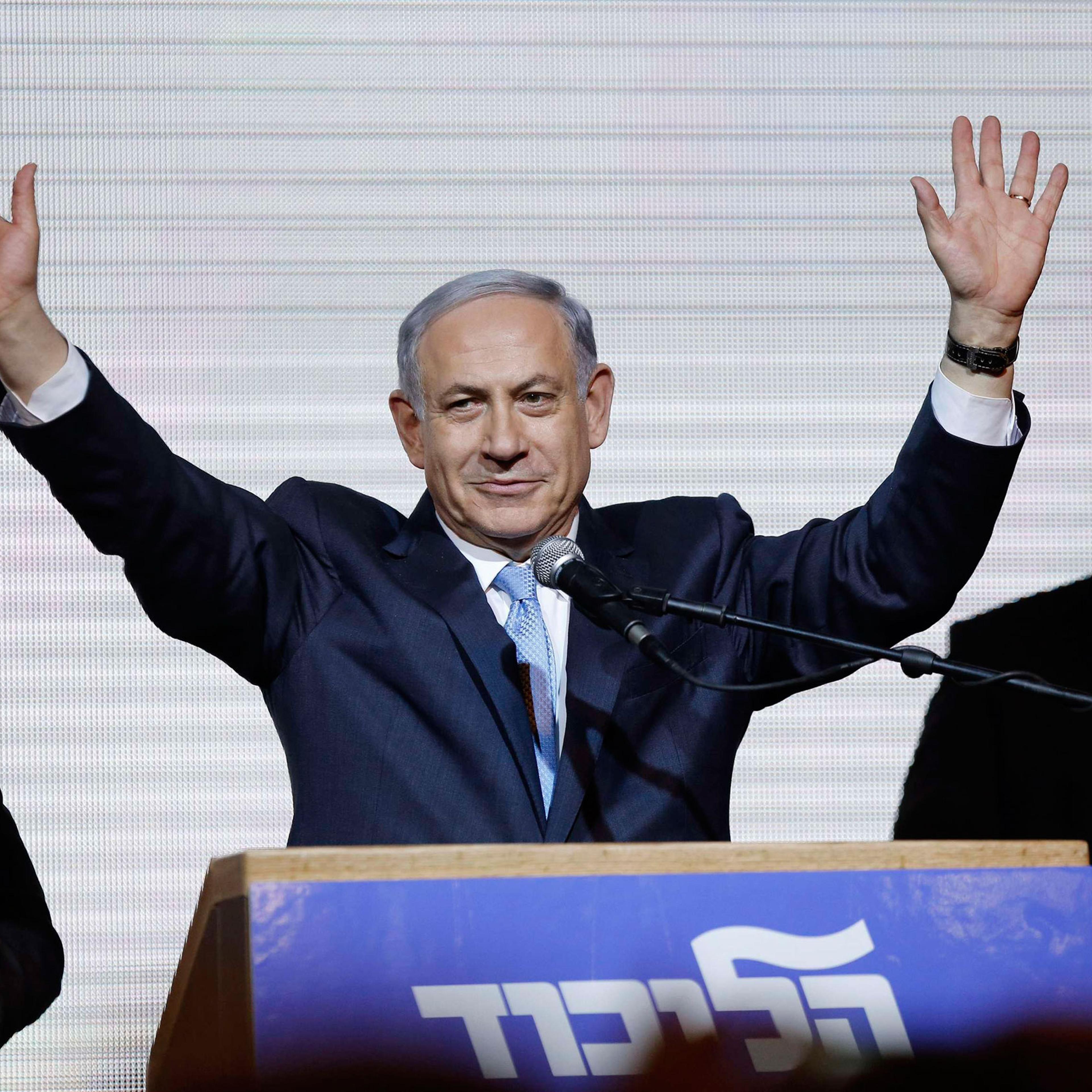 Israeli Prime Minister Benjamin Netanyahu waves to supporters in Tel Aviv March 18, 2015.