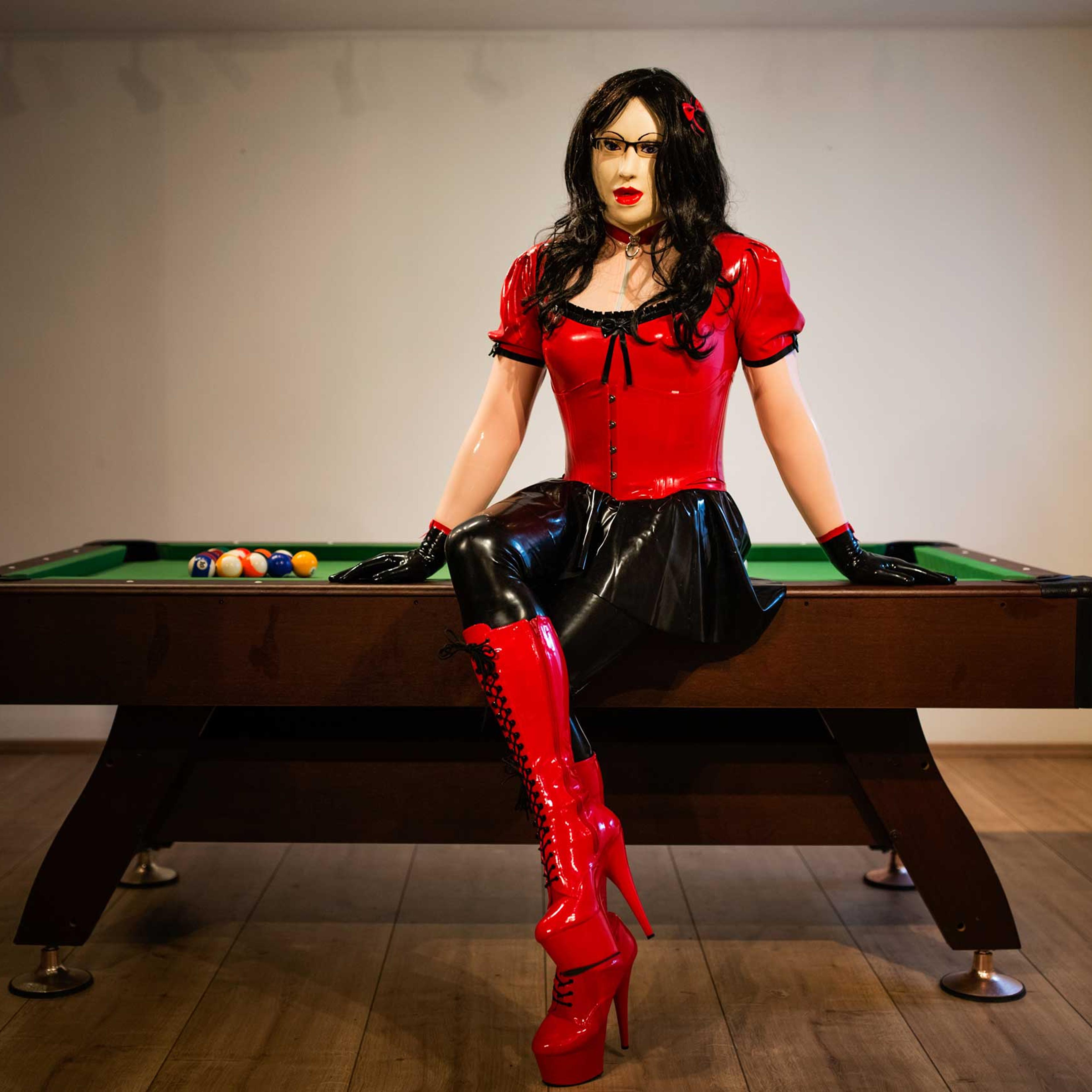 GÖPPINGEN, GERMANY - FEBRUARY 21, 2016: Female masker Manu, 34, alias Mina, poses for a portrait in his home on February 21, 2016 in Göppingen, Germany.'Giving up my manlihood by dressing as a rubberdoll exemplifies 'his bow to the beauty of femininity'.