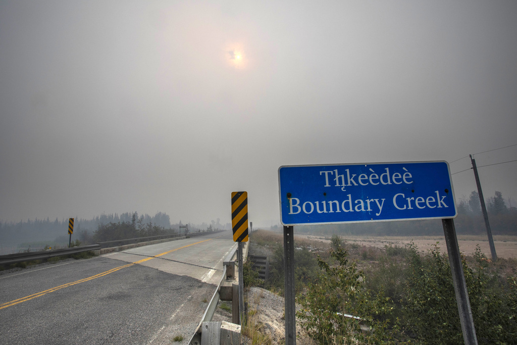 Wildfire smoke fills the air at Boundary Creek, Northwest Territories about 15 miles (25km) east of Yellowknife, Tuesday Aug. 15 2023.