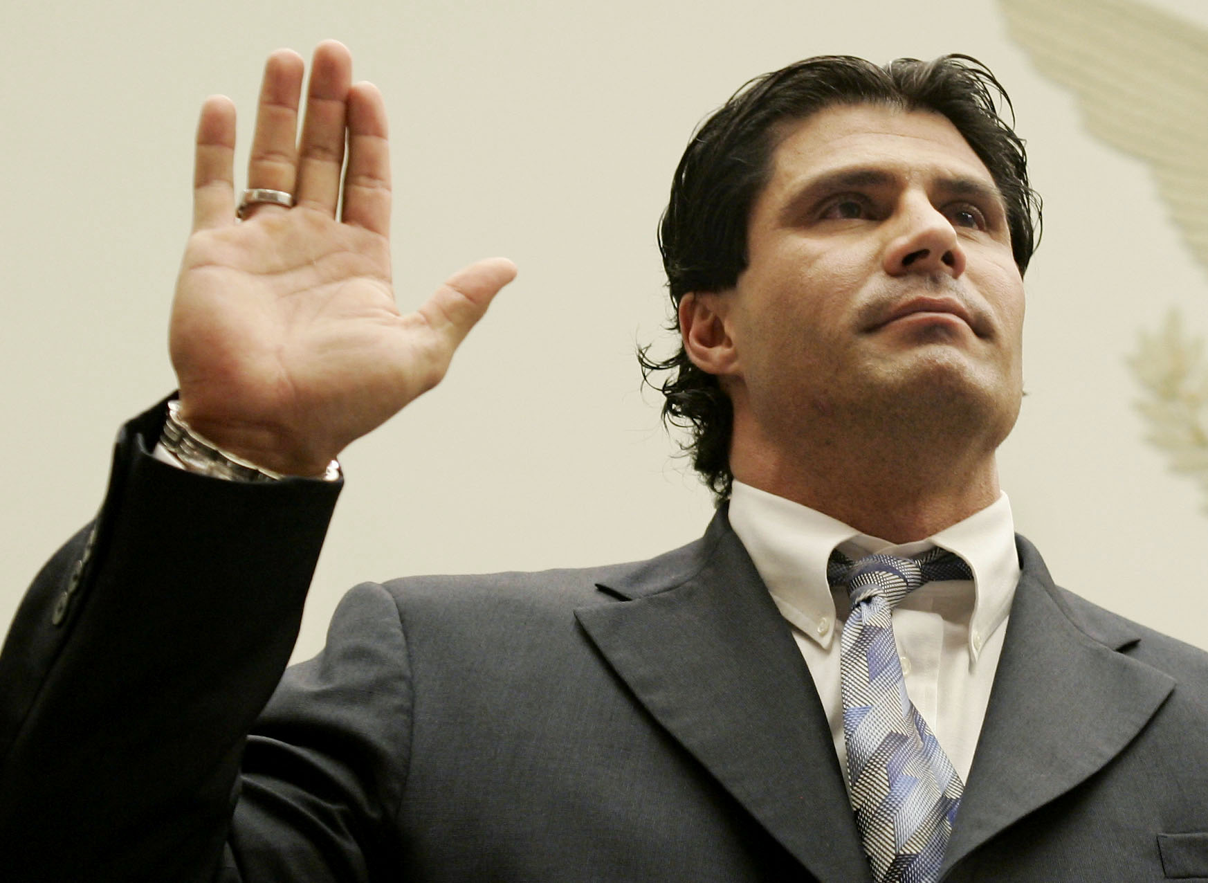 Former major league baseball player Jose Canseco is sworn in for House baseball steroids hearing.