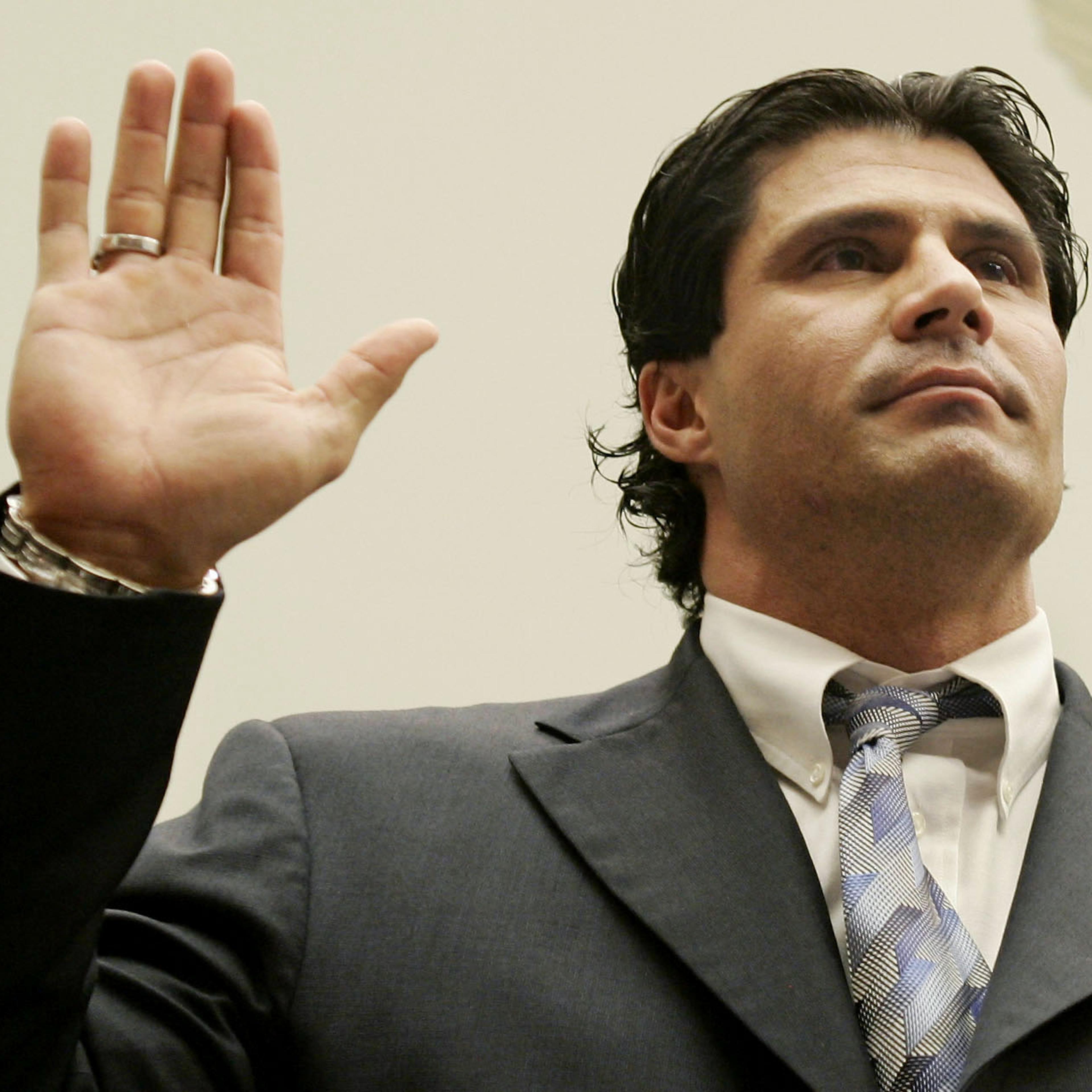 Former major league baseball player Jose Canseco is sworn in for House baseball steroids hearing.