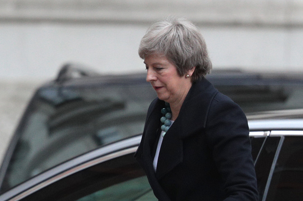 LONDON, ENGLAND - DECEMBER 10: Prime Minister Theresa May arrives back in Downing Street on December 10, 2018 in London, England. (Photo by Dan Kitwood/Getty Images)  The Prime Minister is holding meetings with her backbench MPs today in the hope of reas