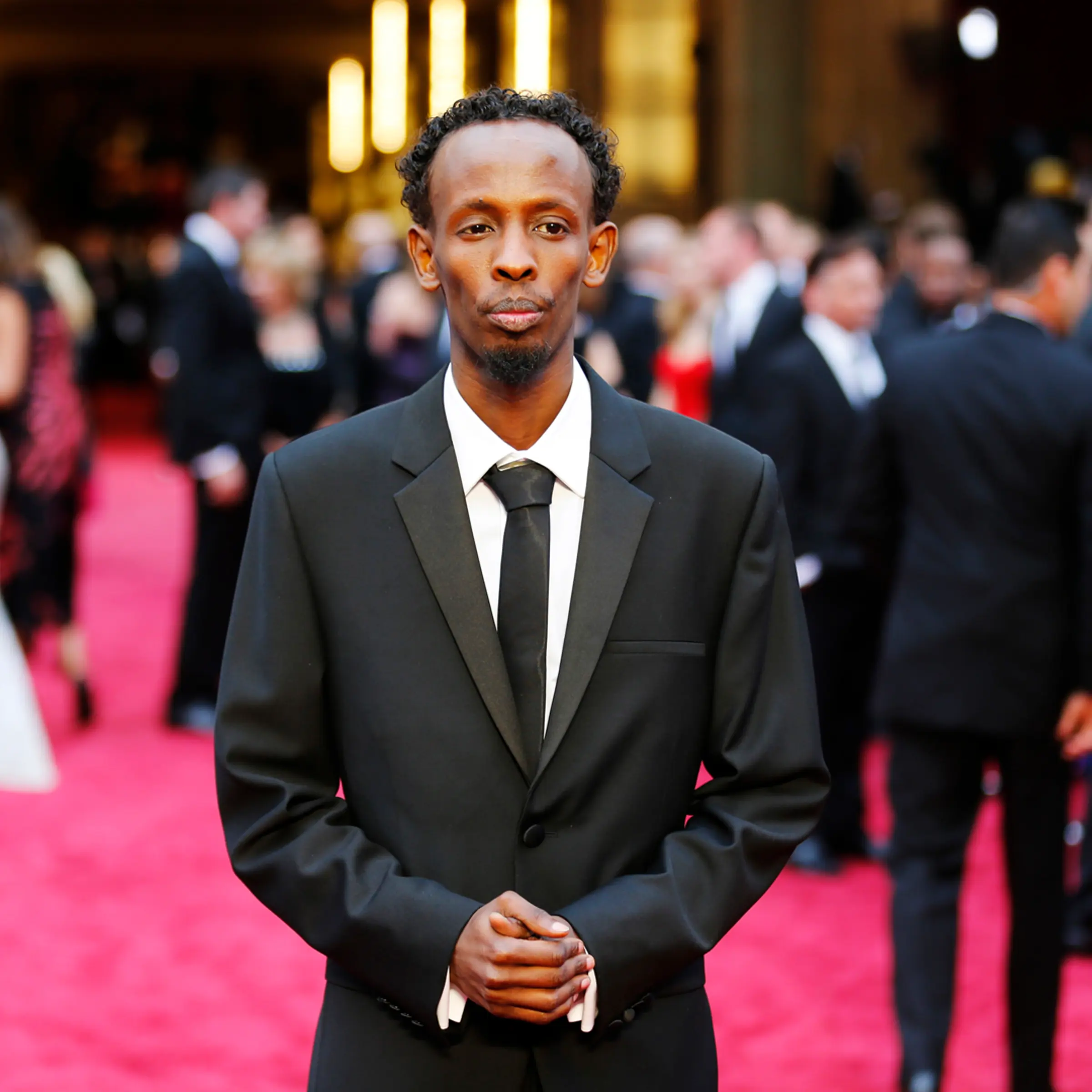 Abdi, best supporting actor nominee for his role in "Captain Phillips", arrives at the 86th Academy Awards in Hollywood