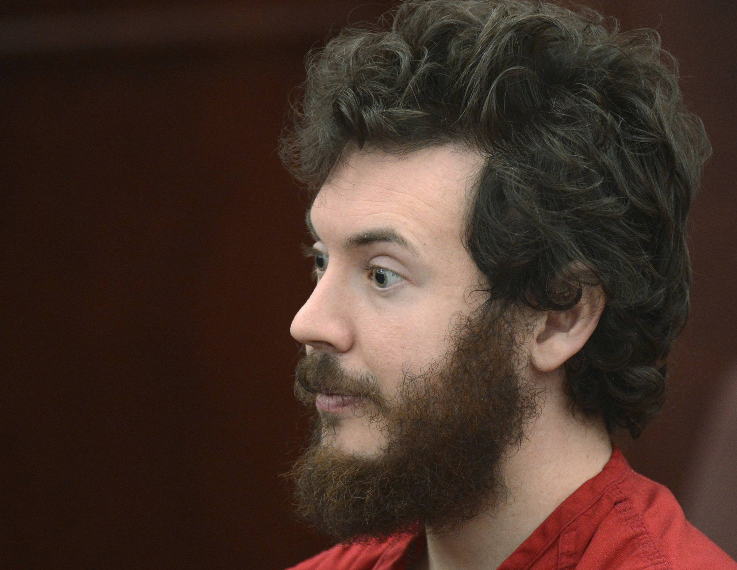 Accused Aurora theater gunman James Holmes listens during his arraignment in Centennial, Colo. in this March 12, 2013.