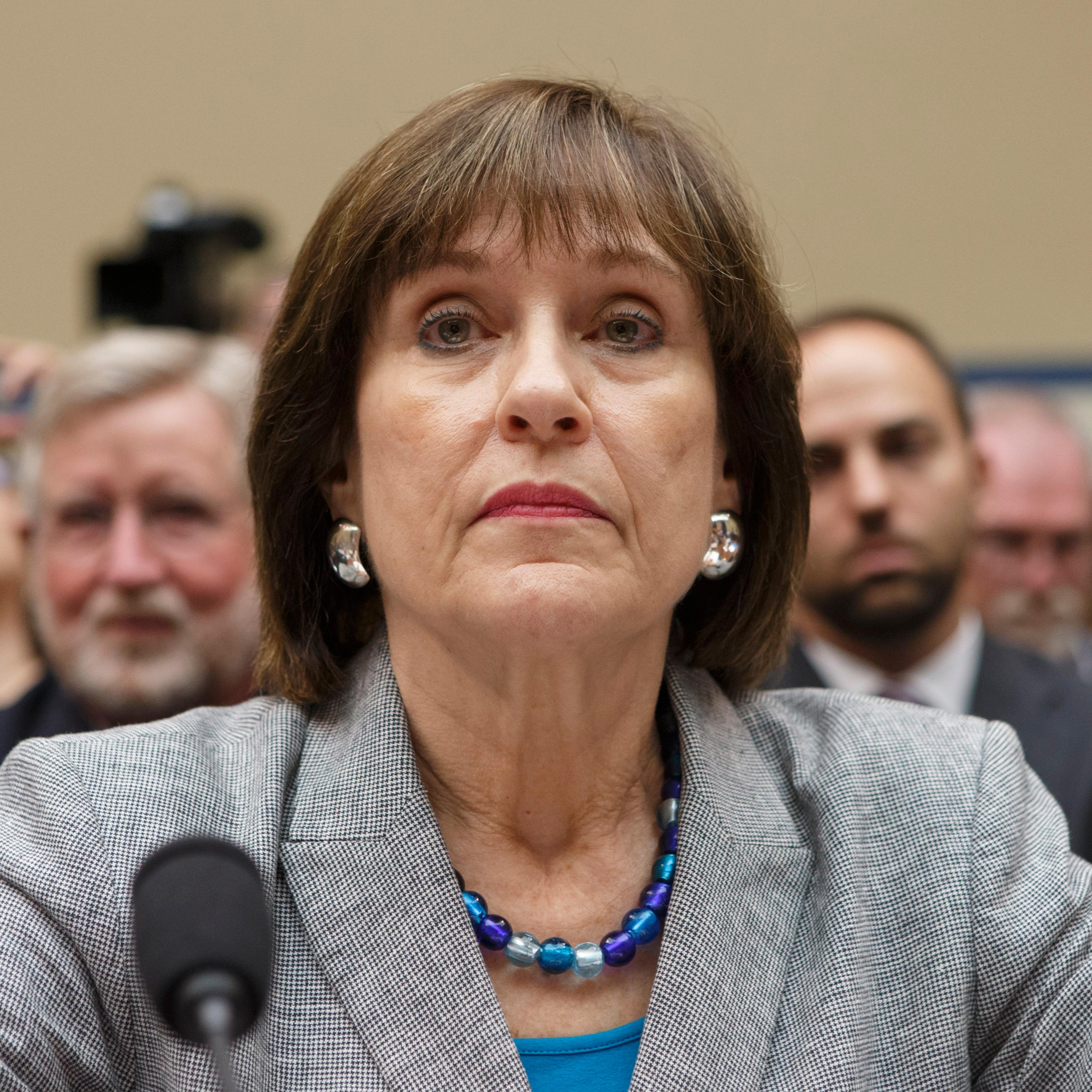Internal Revenue Service official Lois Lerner refuses to answer questions as the House Oversight Committee holds a hearing to investigate the extra scrutiny the IRS gave Tea Party and other conservative groups that applied for tax-exempt status, on Capit