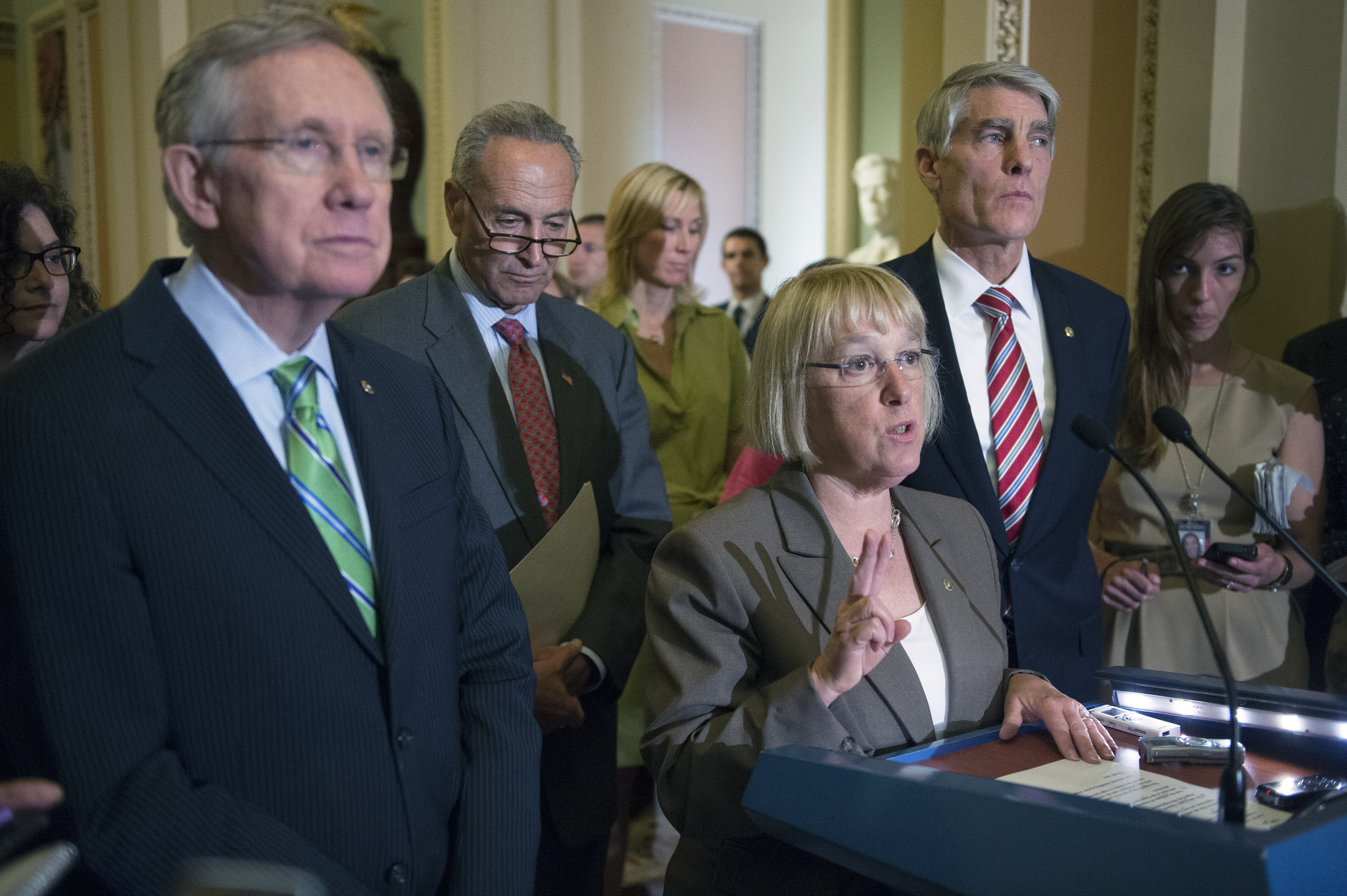 Sen. Patty Murray, D-Was,. is joined by Sen. Mark Udall, D-Col,. Senate Majority Leader Harry Reid D-Nev., and Sen. Charles Schumer, D-N.Y., at a news conference following a procedural vote on S.2578, the "Protect Women's Heath From Cooperate Interferenc