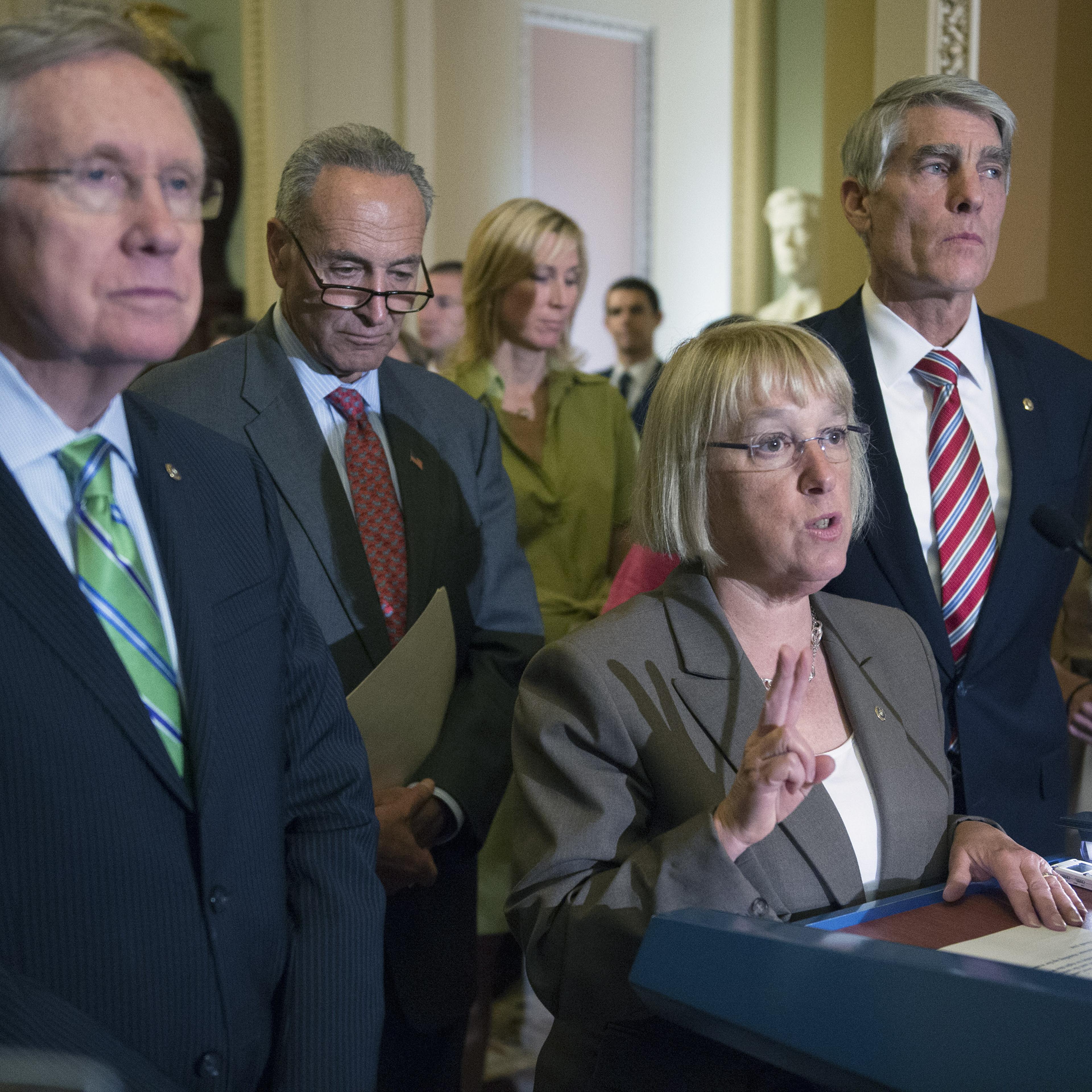 Sen. Patty Murray, D-Was,. is joined by Sen. Mark Udall, D-Col,. Senate Majority Leader Harry Reid D-Nev., and Sen. Charles Schumer, D-N.Y., at a news conference following a procedural vote on S.2578, the "Protect Women's Heath From Cooperate Interferenc