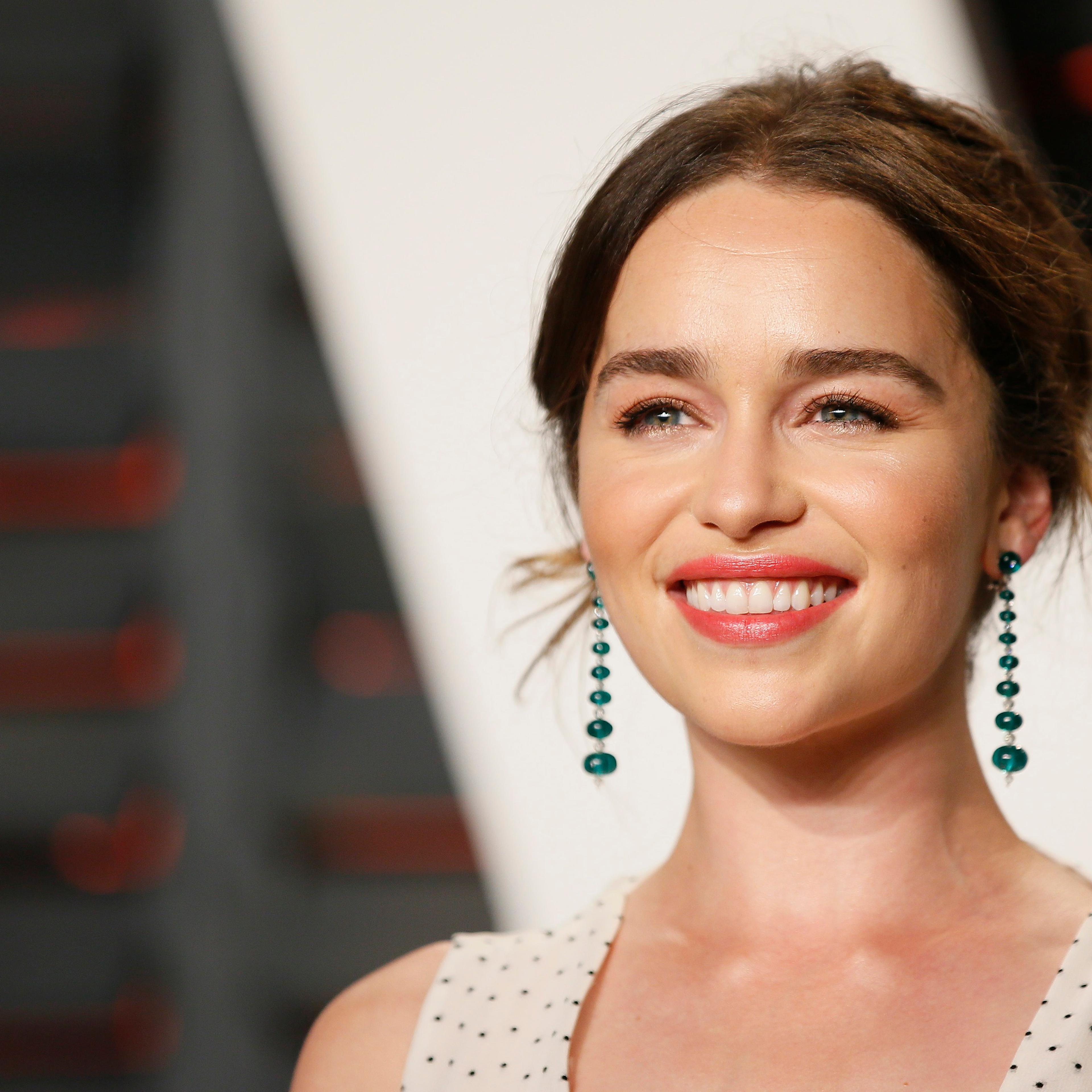 Actress Emilia Clarke arrives at the Vanity Fair Oscar Party in Beverly Hills