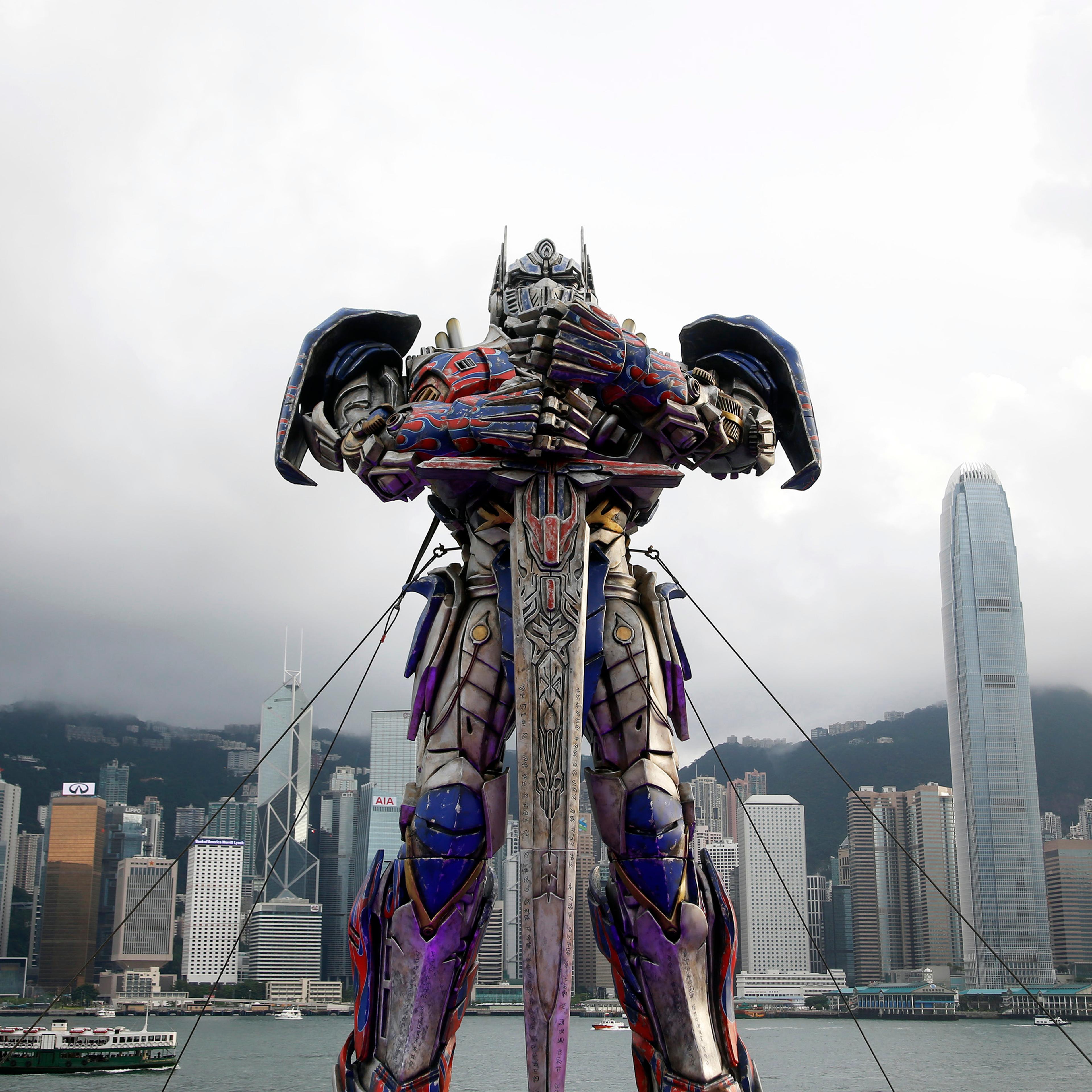 A 21-foot tall model of the Transformers character Optimus Prime is displayed on the red carpet before the world premiere of the film "Transformers: Age of Extinction" in Hong Kong