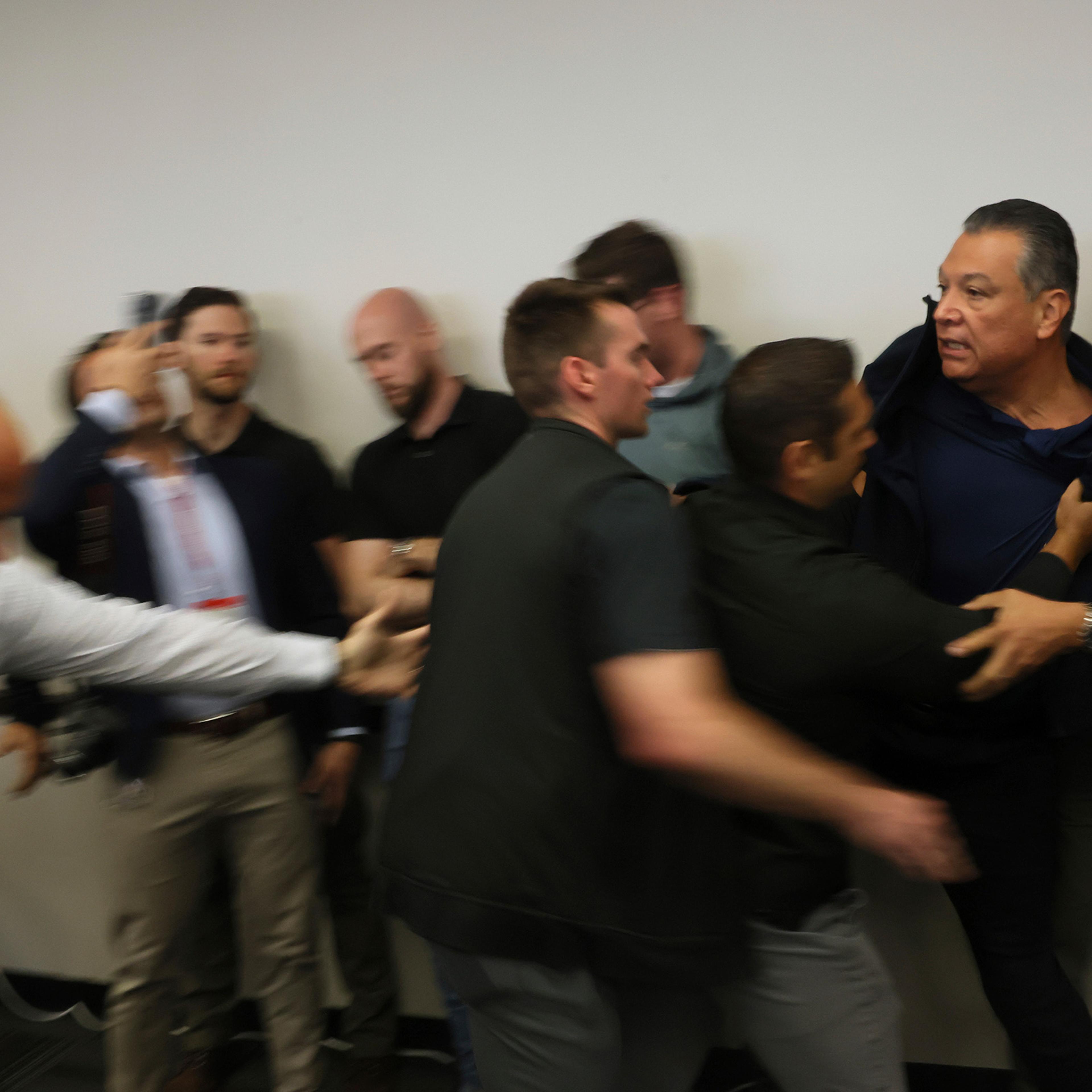 California Senator Alex Padilla is pushed out of the room as Noem holds a news conference regarding the recent protests in Los Angeles on June 12, 2025.