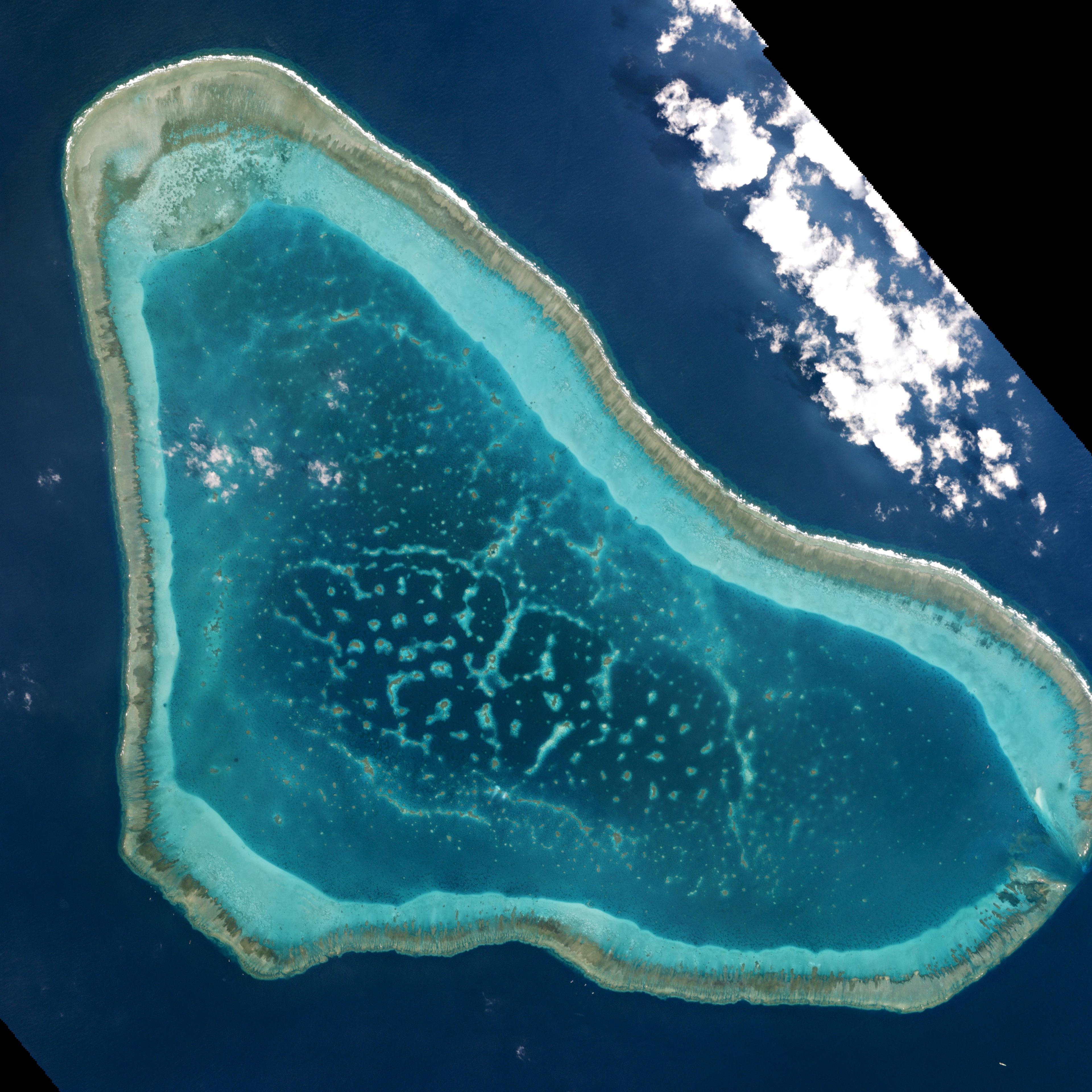 Boats at Scarborough Shoal in the South China Sea are shown in this handout photo provided by Planet Labs
