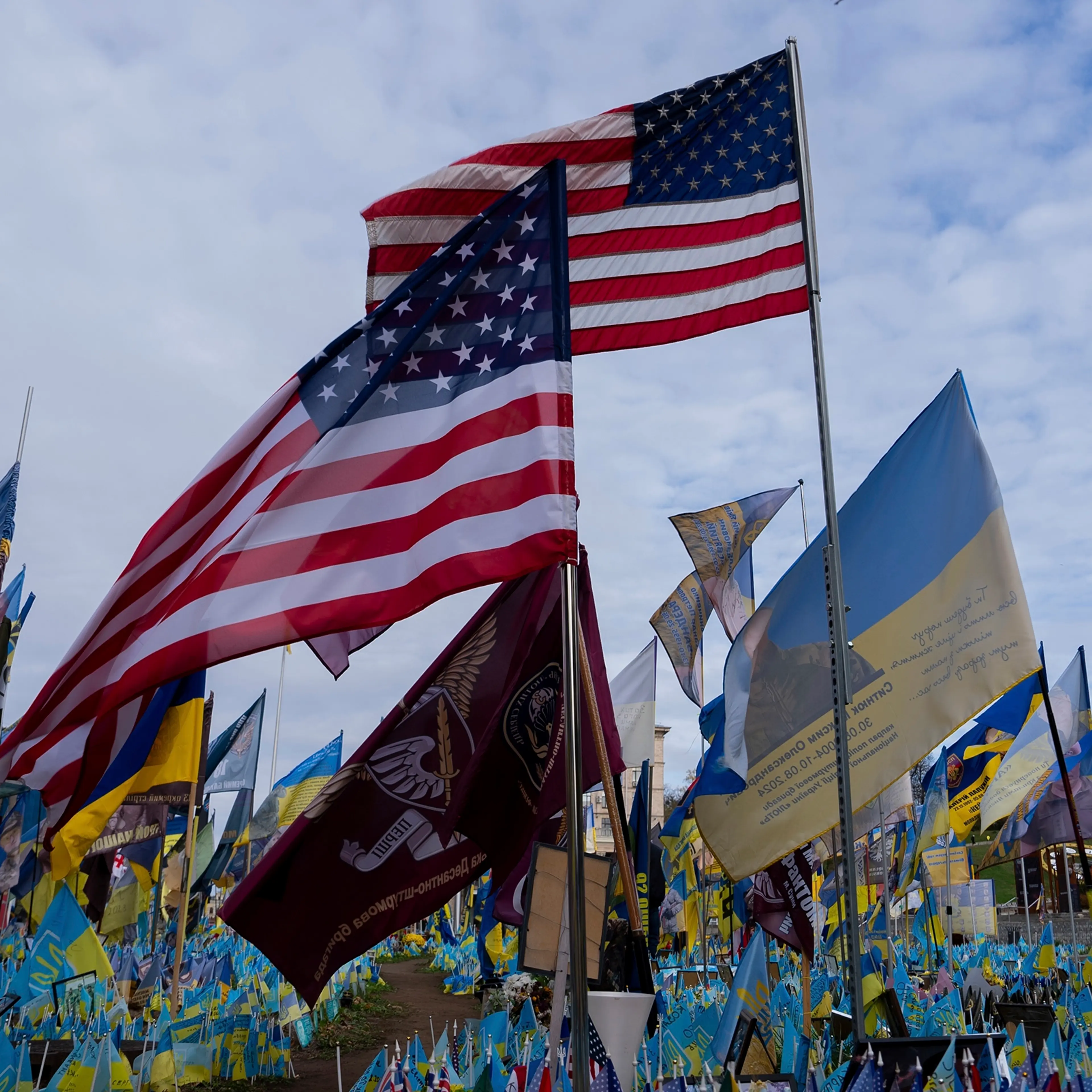 American and Ukrainian flags placed in honour of fallen servicemen are displayed in Kyiv, Ukraine, Nov. 5, 2024.