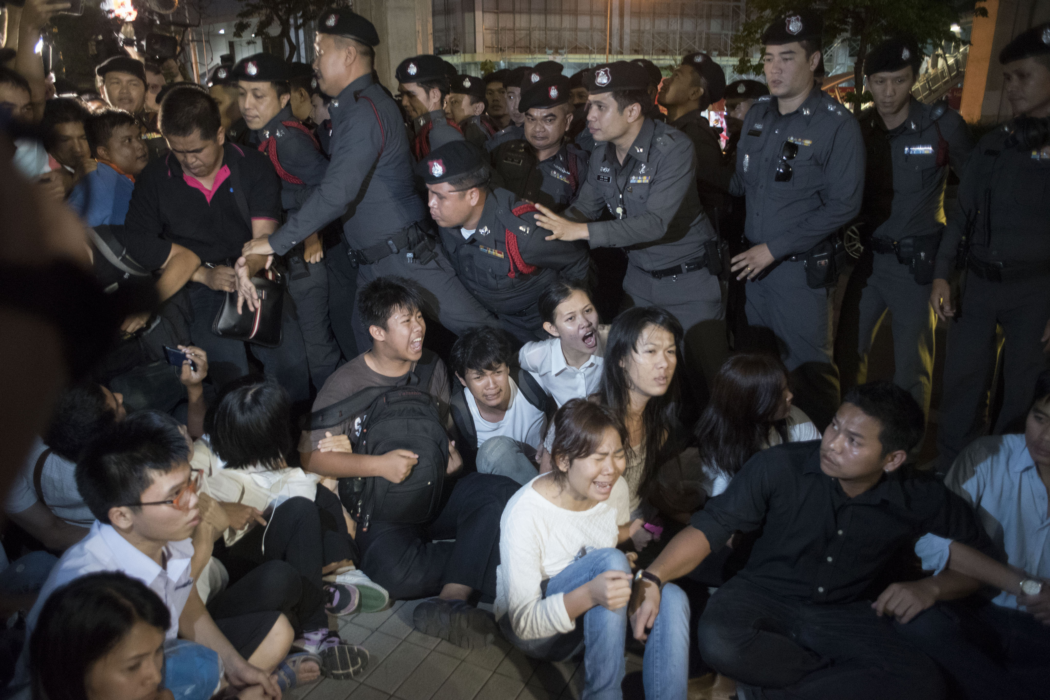Thai police arrest students during an antijunta demonstration on May 22, 2015, in Bangkok 