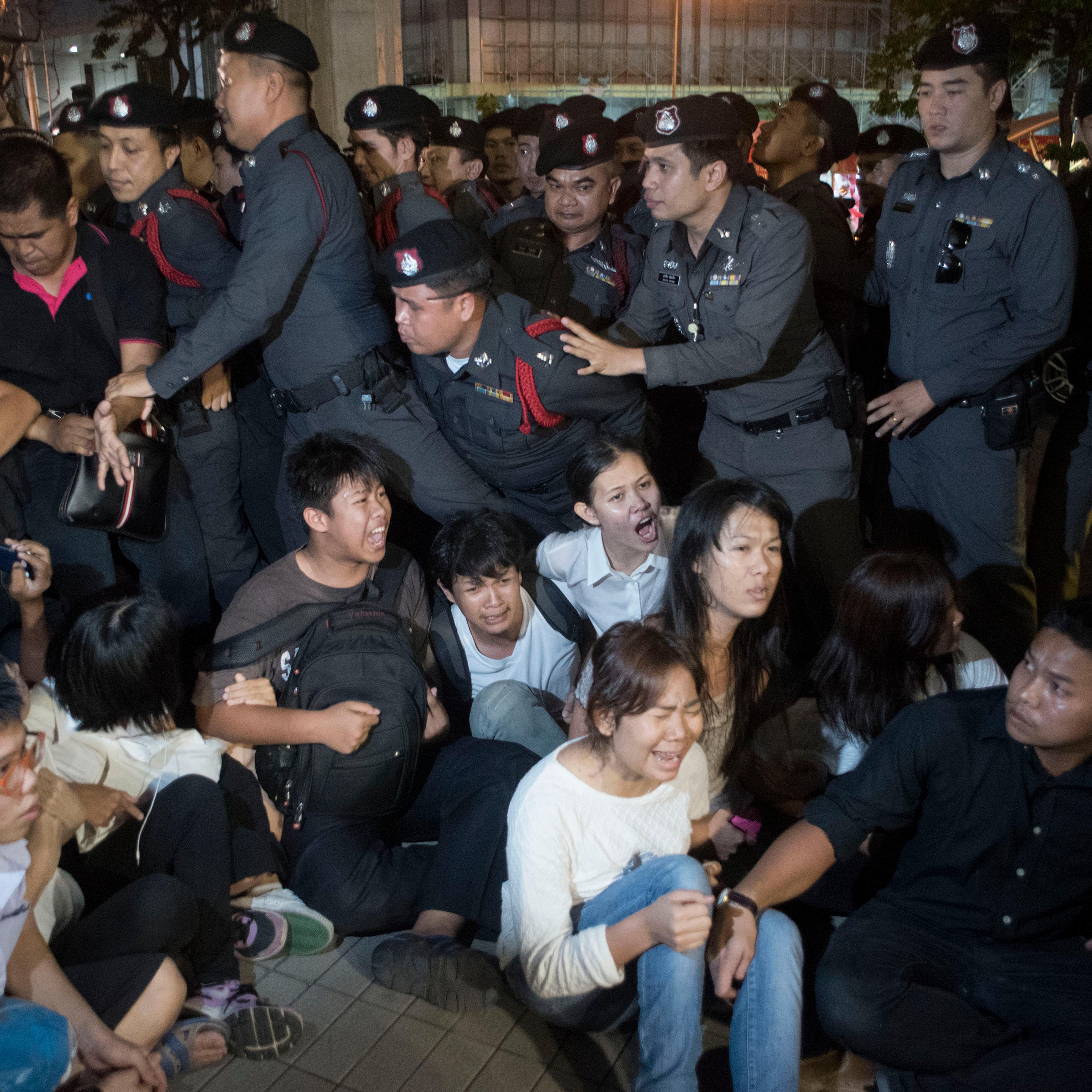 Thai police arrest students during an antijunta demonstration on May 22, 2015, in Bangkok