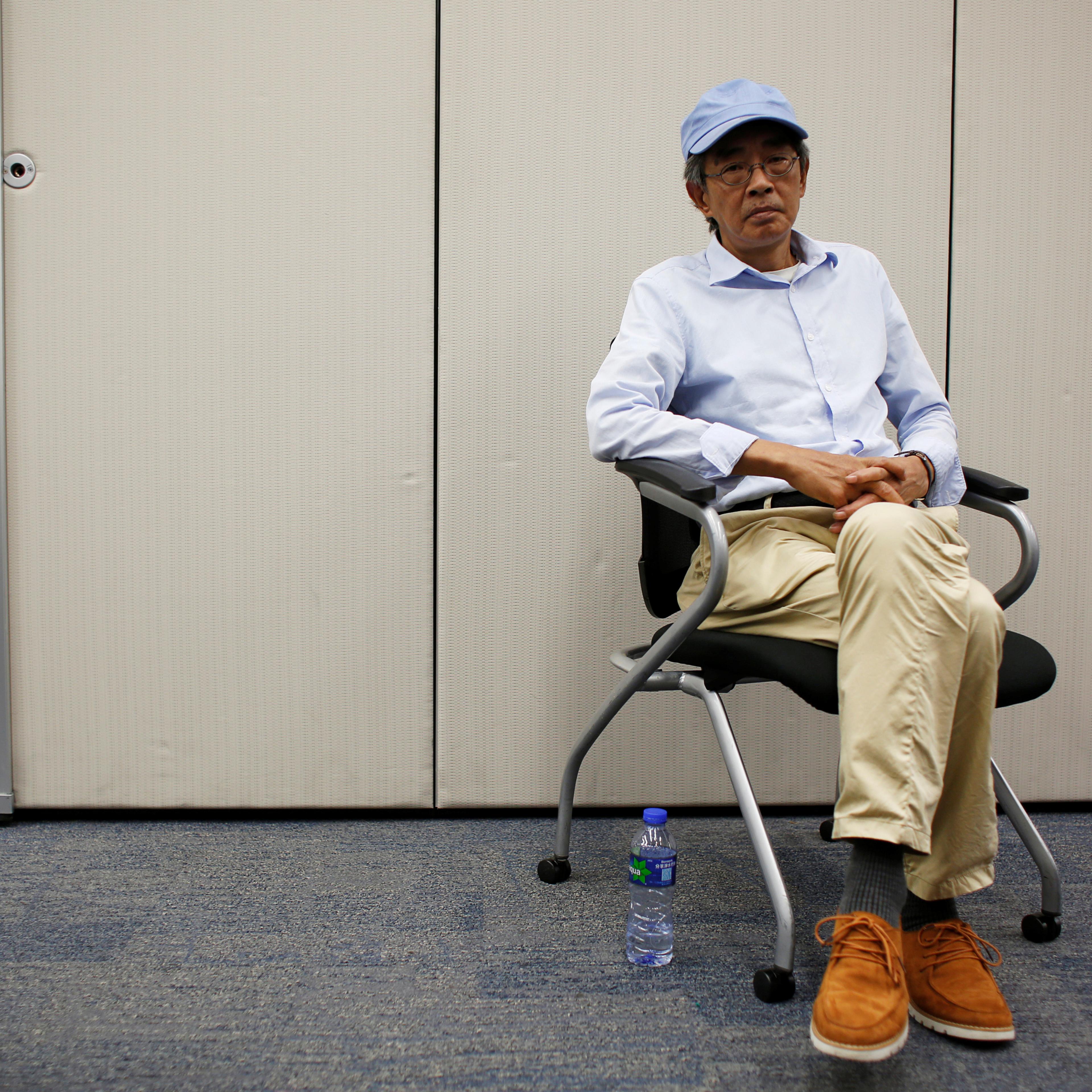 Bookseller Lam Wing-kee poses during an interview in Hong Kong