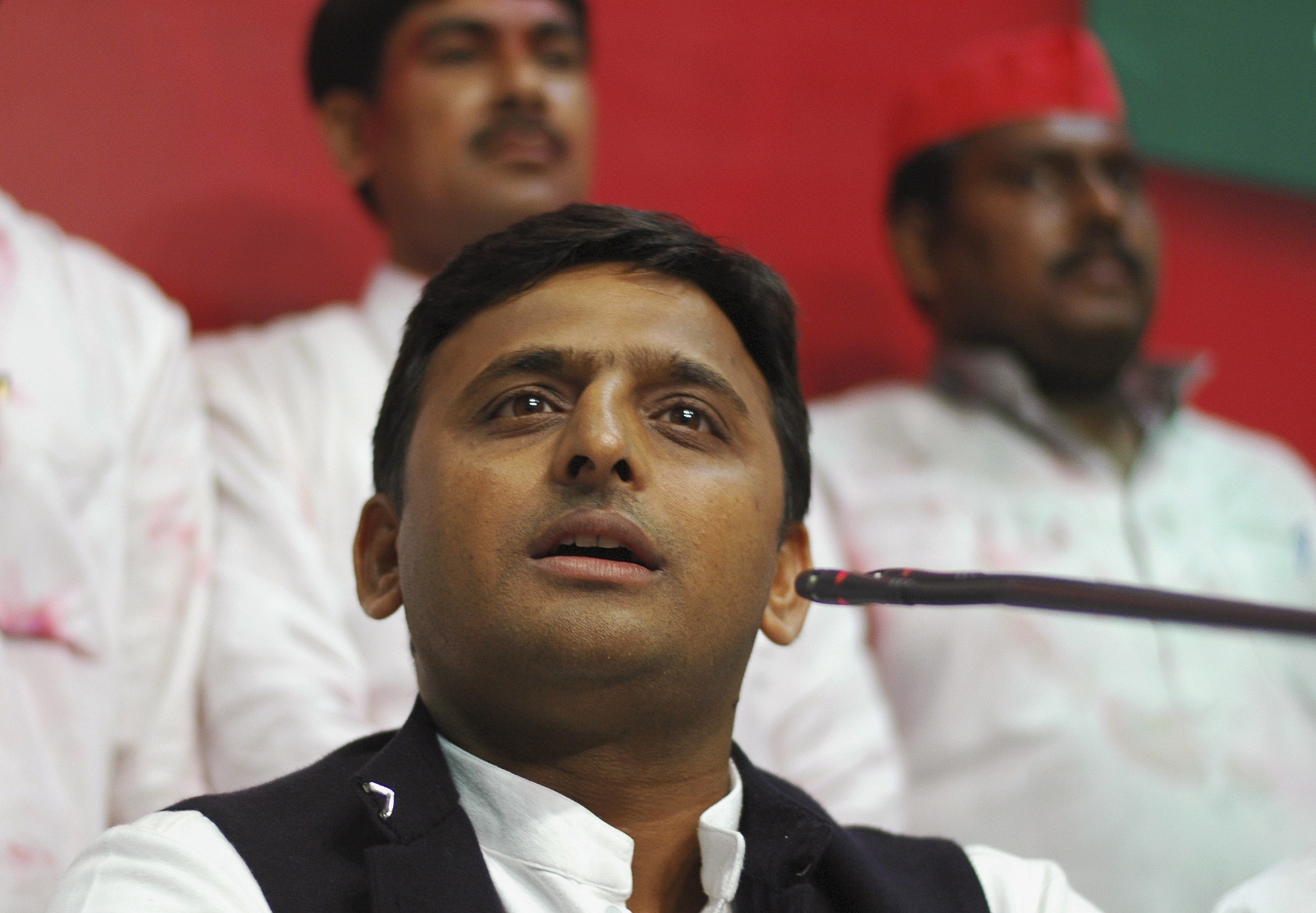 Akhilesh Yadav speaks during a news conference at their party headquarters in Lucknow