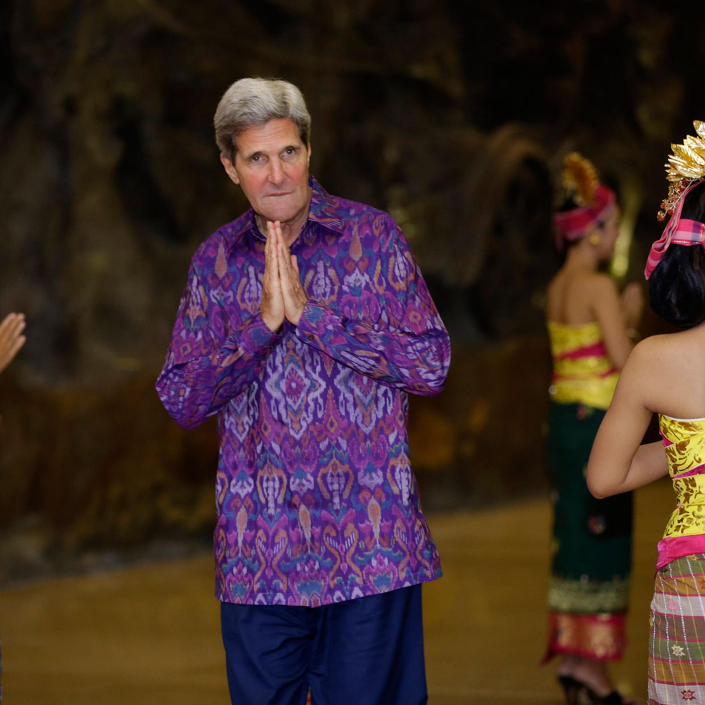 Oct. 7, 2013. U.S. Secretary of State John Kerry, wearing 'endek', a traditional Balinese woven fabric, arrives at a dinner for leaders of the Asia-Pacific Economic Cooperation forum in Bali.