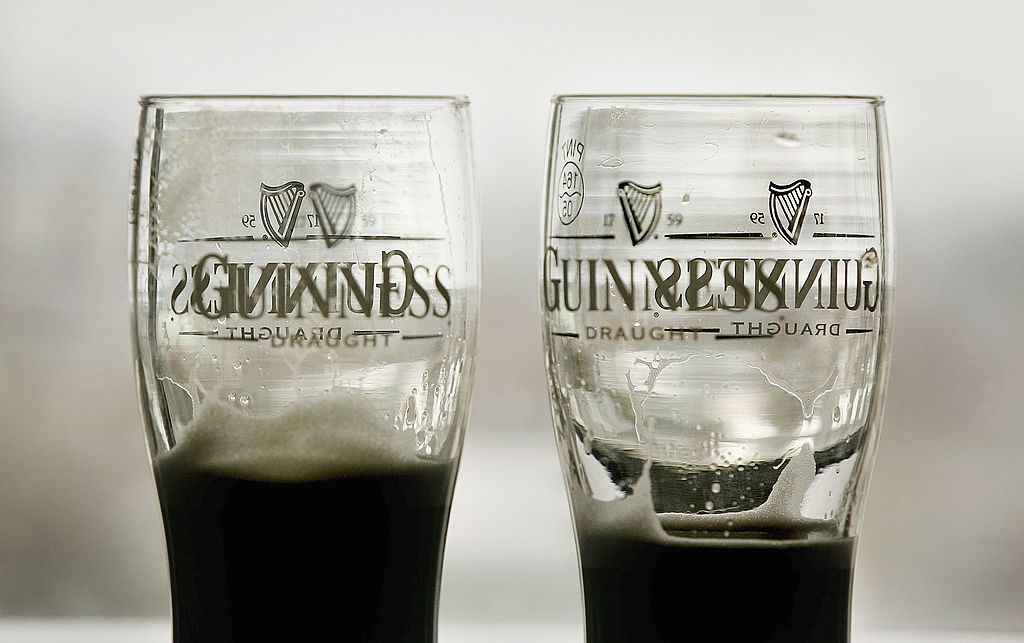Half drunk pints are seen at the bar within the Guinness brewery in Dublin, Ireland.