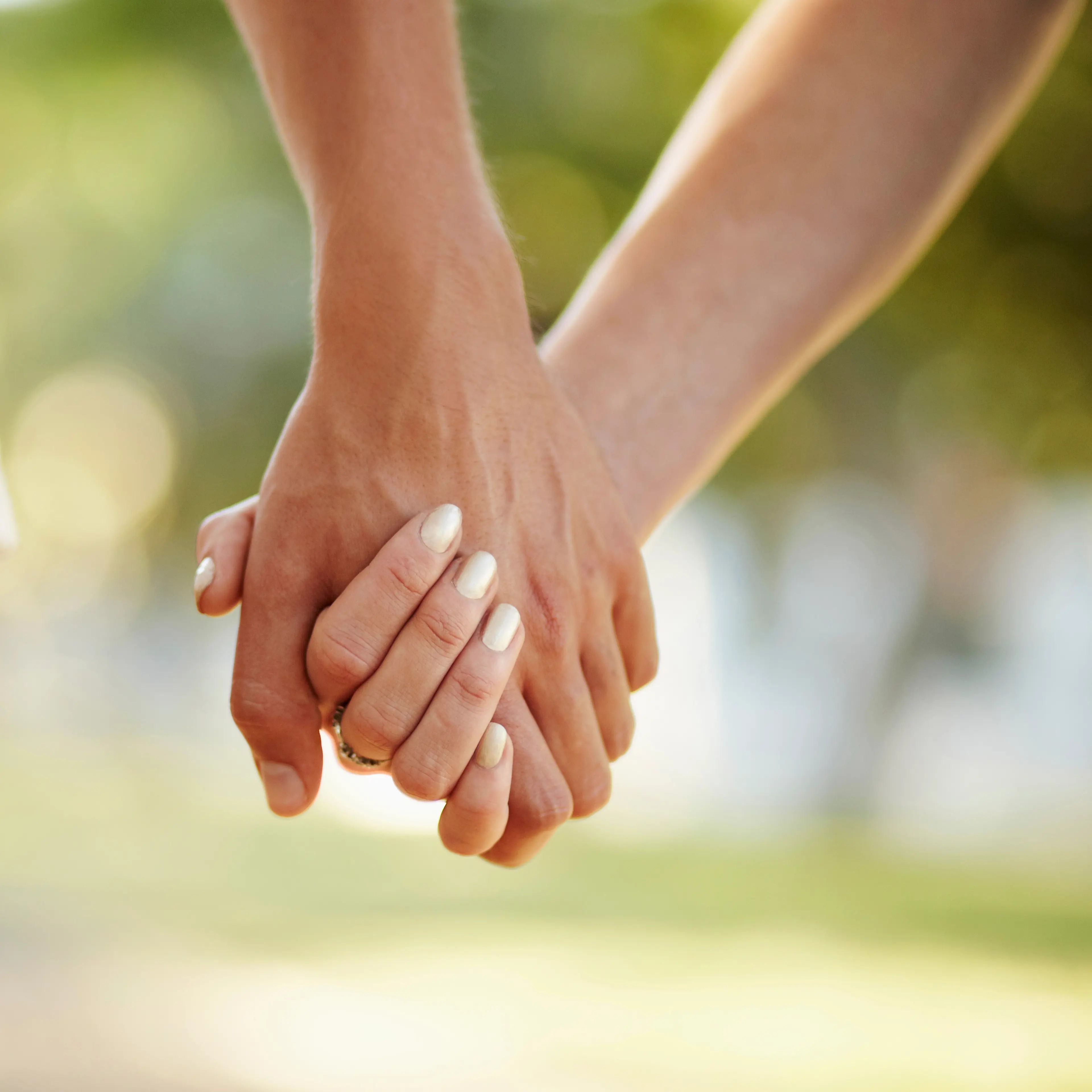 young-couple-holding-hands
