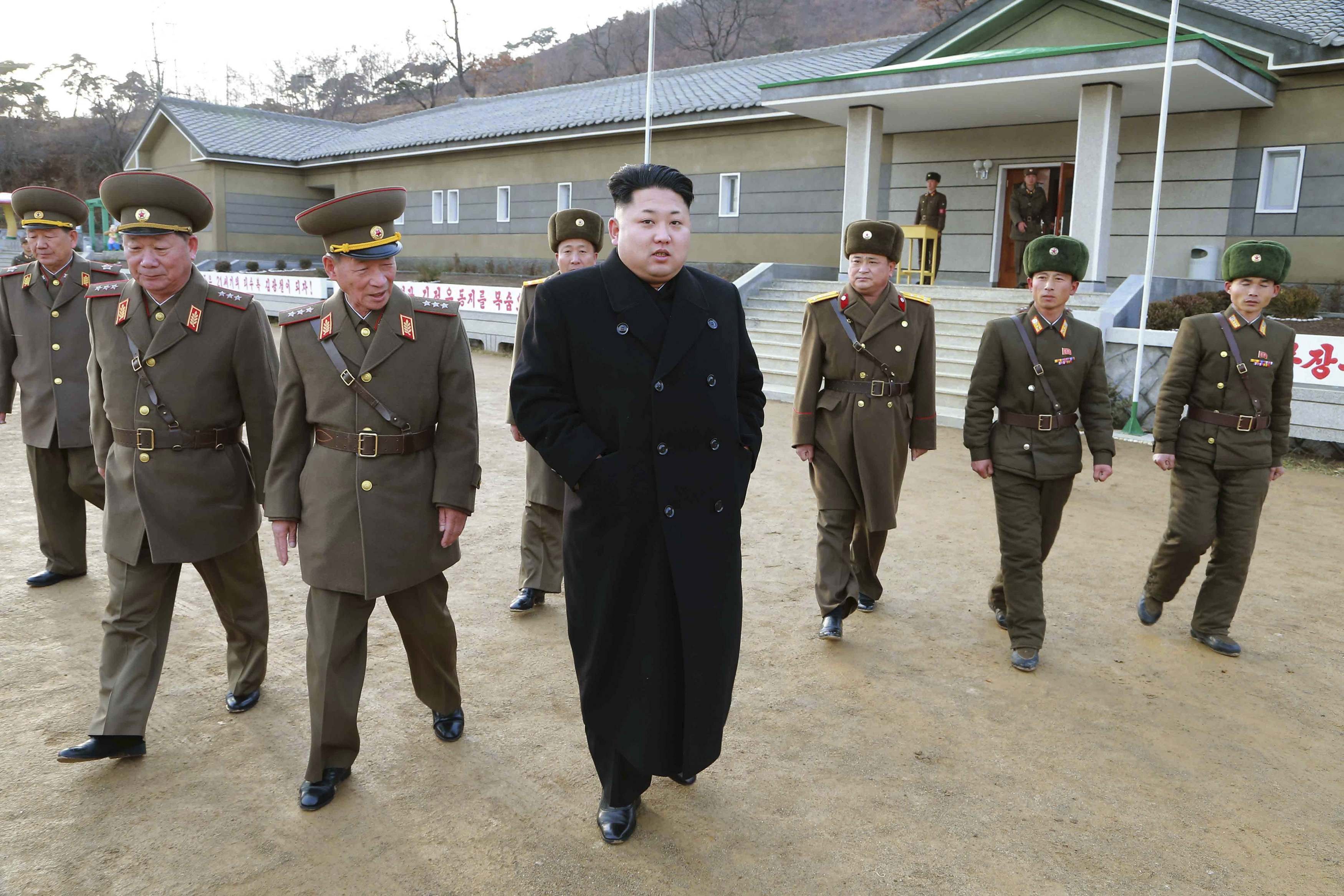 North Korean leader Kim inspects the Artillery Company under the KPA Unit 963, in this undated photo released by North Korea's KCNA in Pyongyang