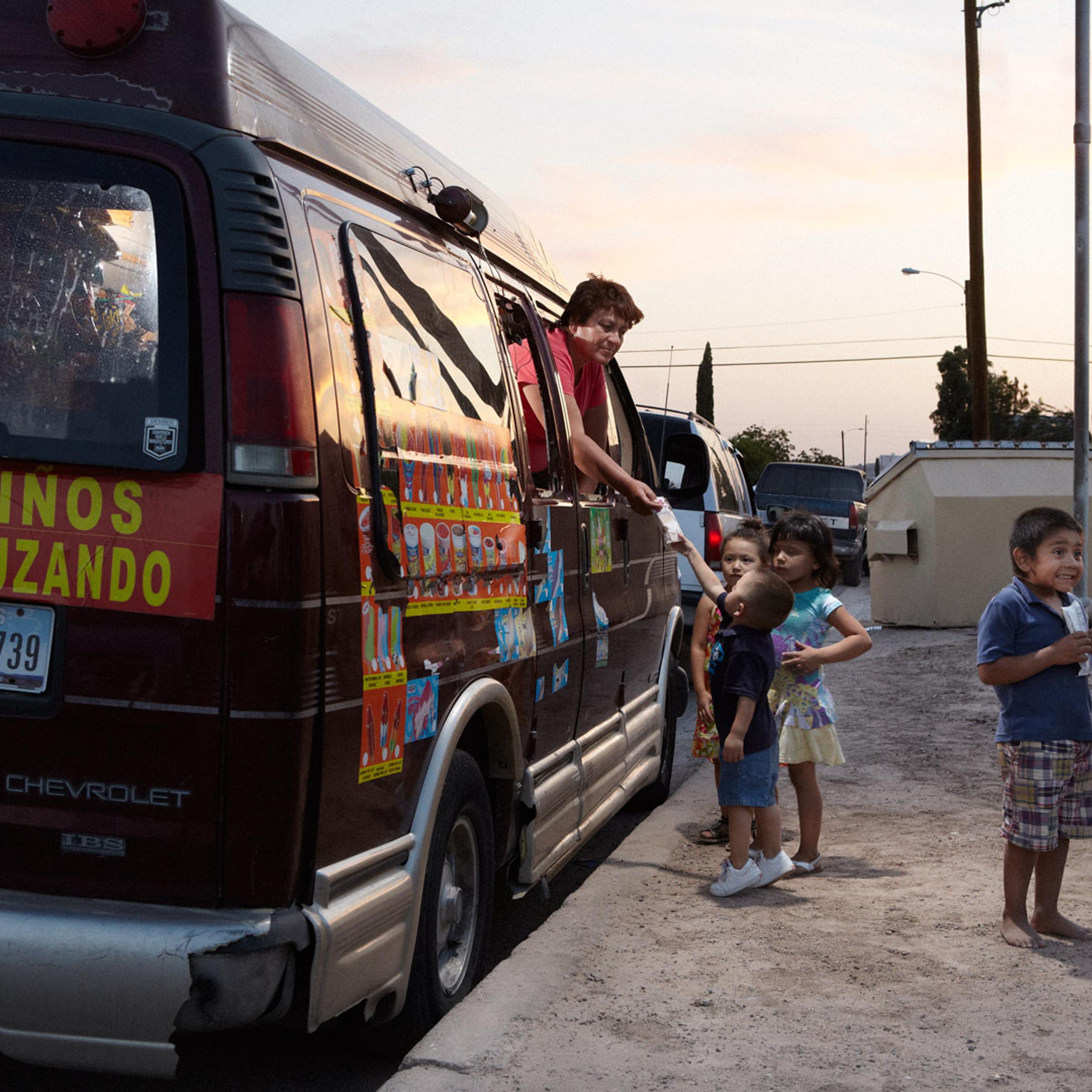 Rosa and her makeshift ice cream truck delight the neighborhood kids.
