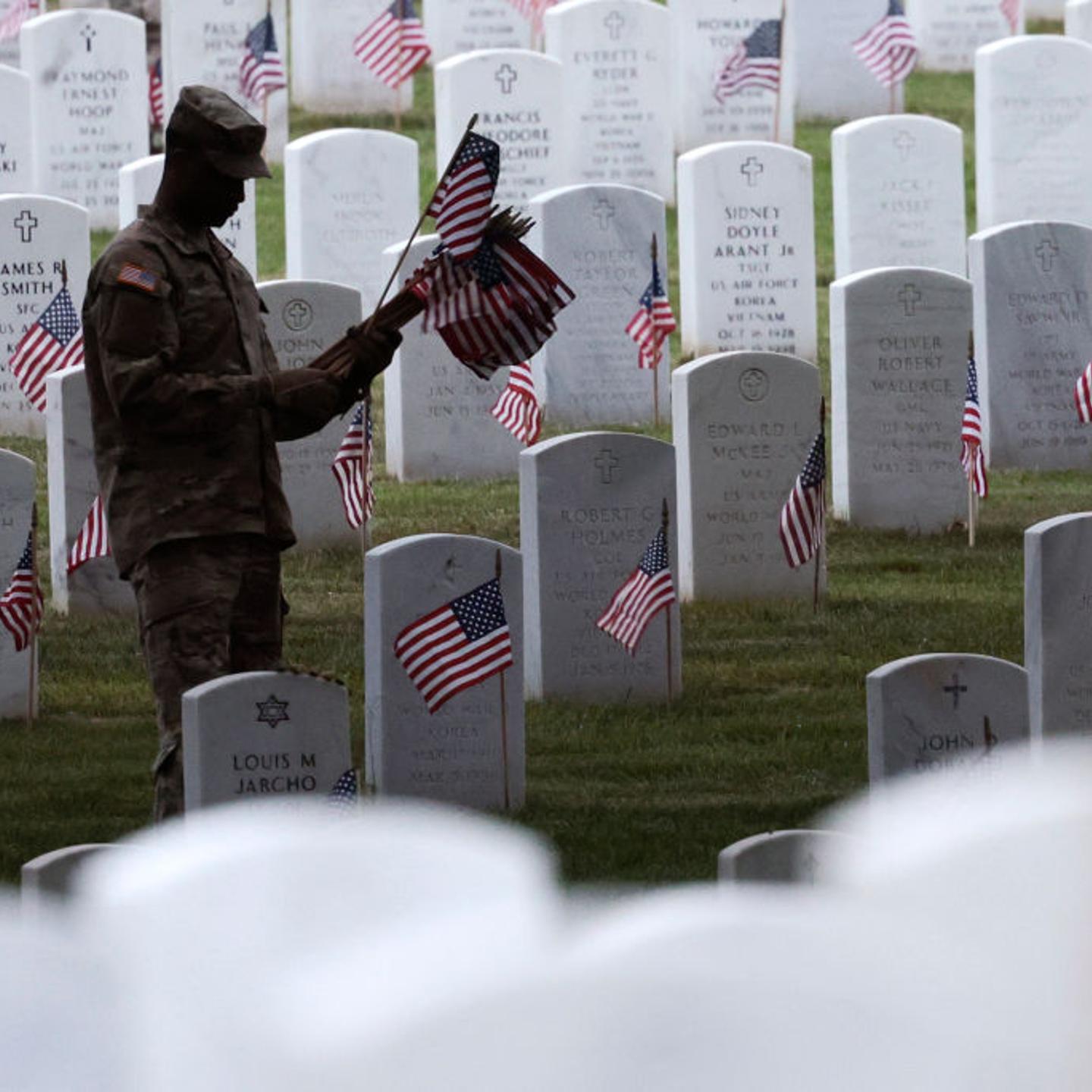 Annual Flags-In Event Held At Arlington Cemetery Ahead Of Memorial Day