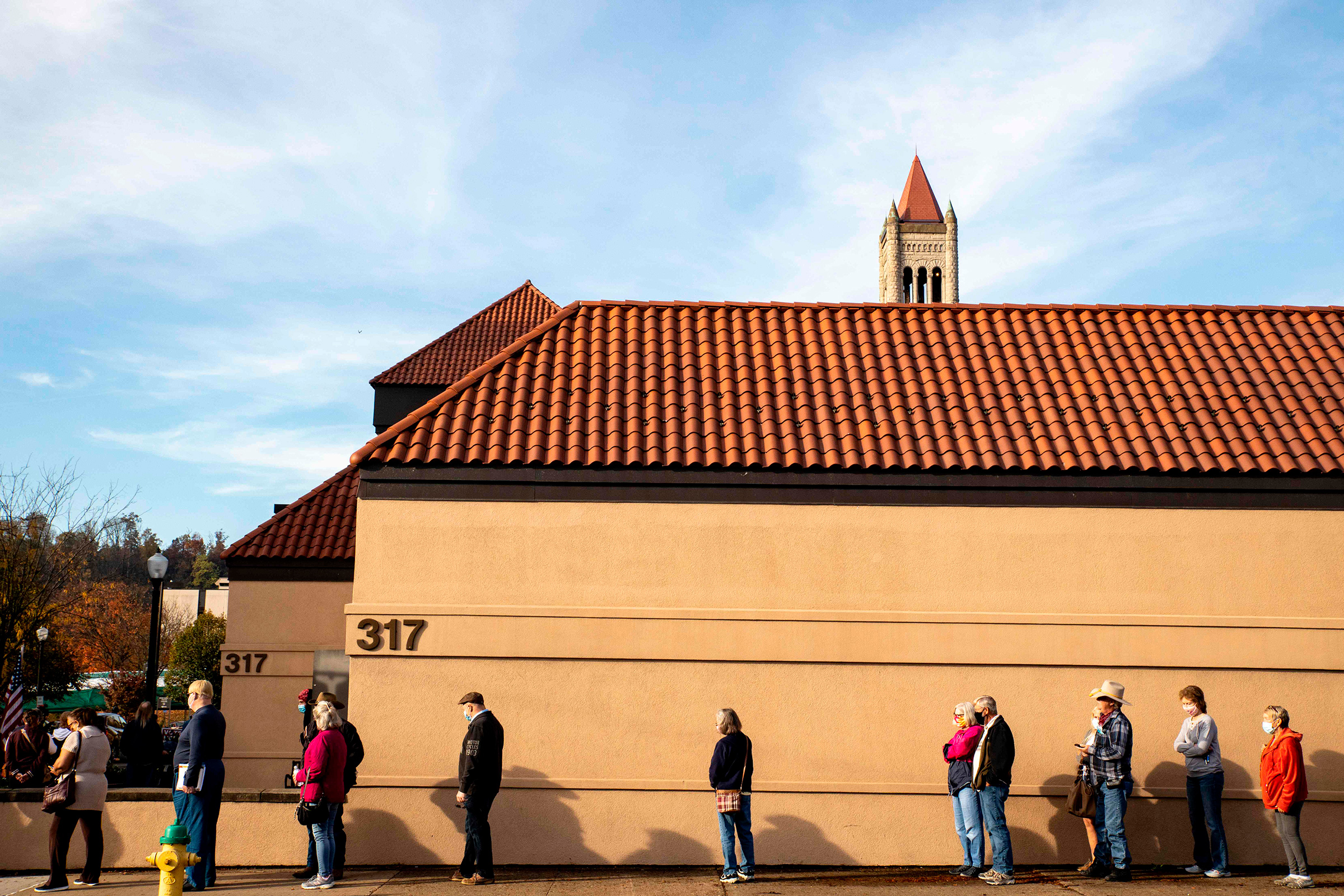 On Oct. 21, early voters line up outside of the Judge Black Annex polling location in Parkersburg, W. Va