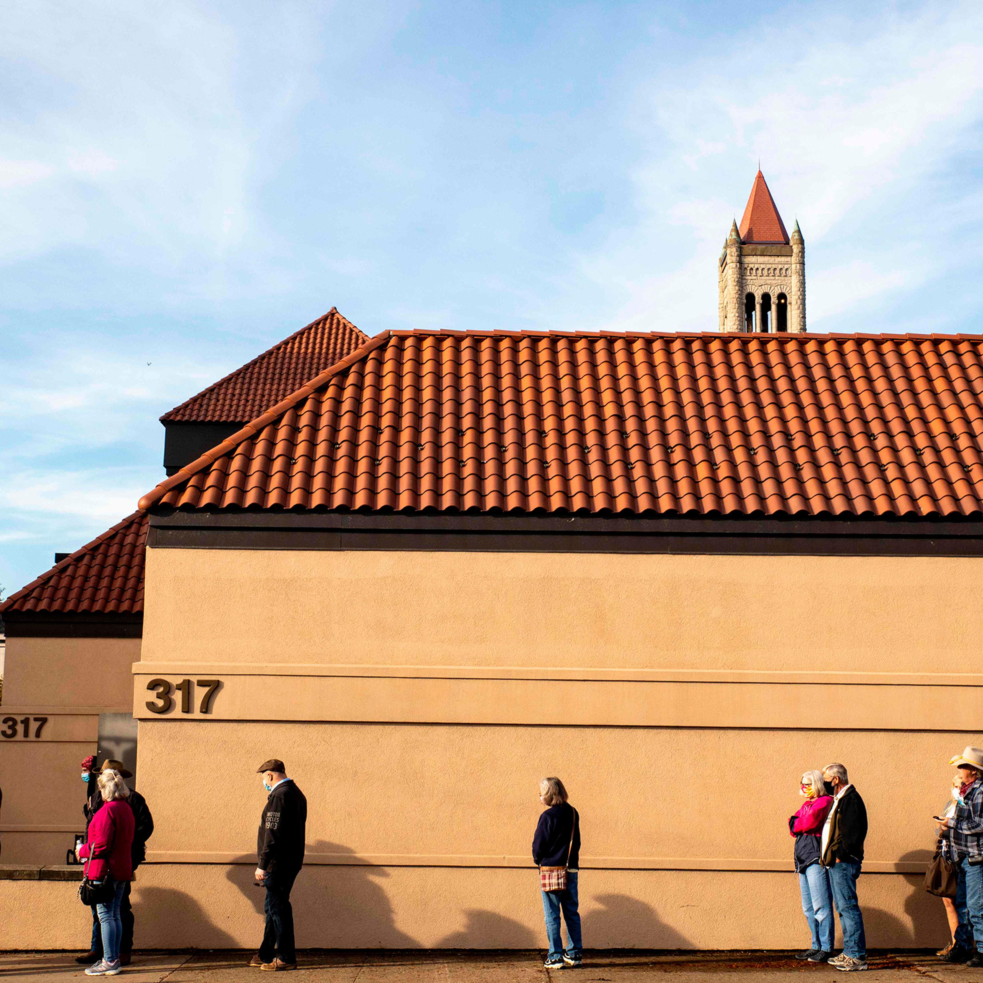 On Oct. 21, early voters line up outside of the Judge Black Annex polling location in Parkersburg, W. Va