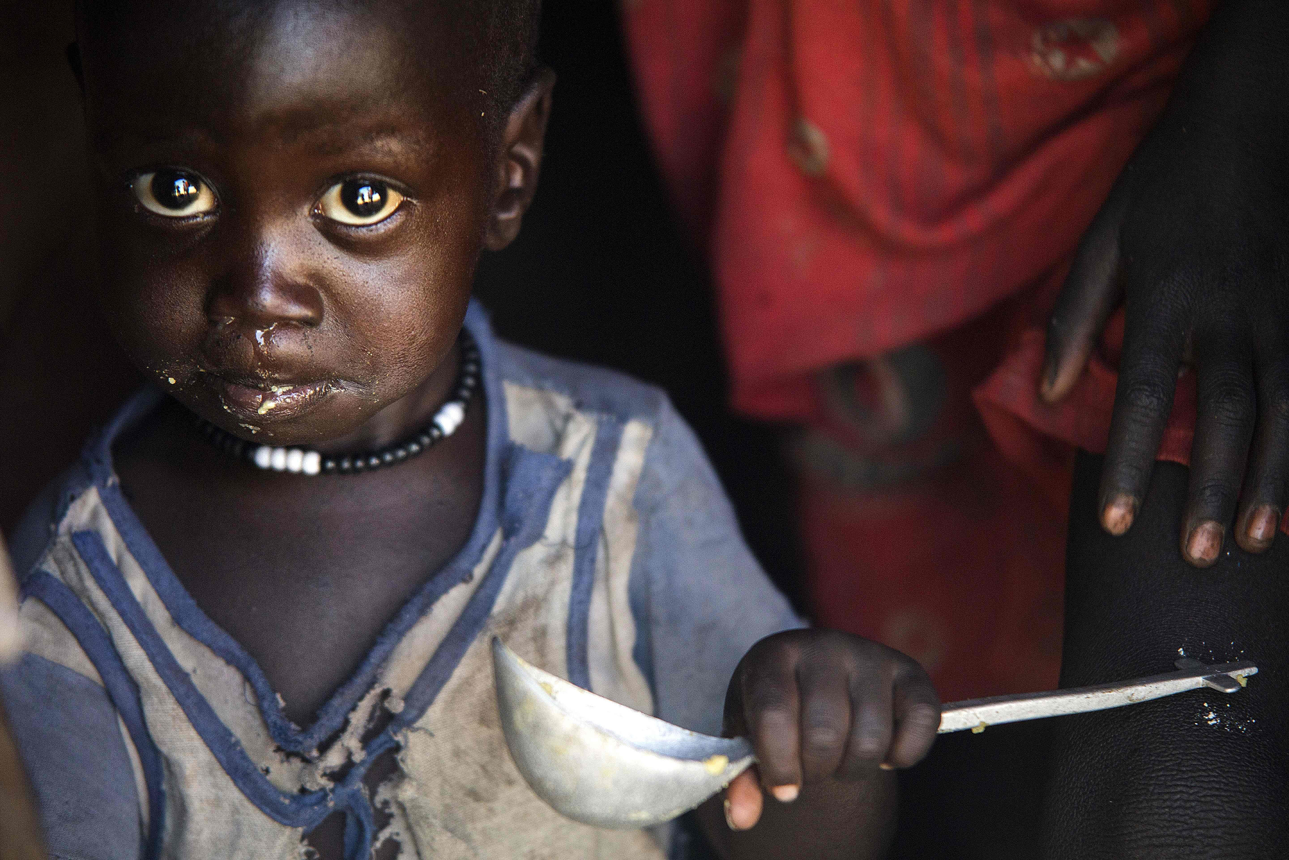 man-climate-change-humanitarian-crisis