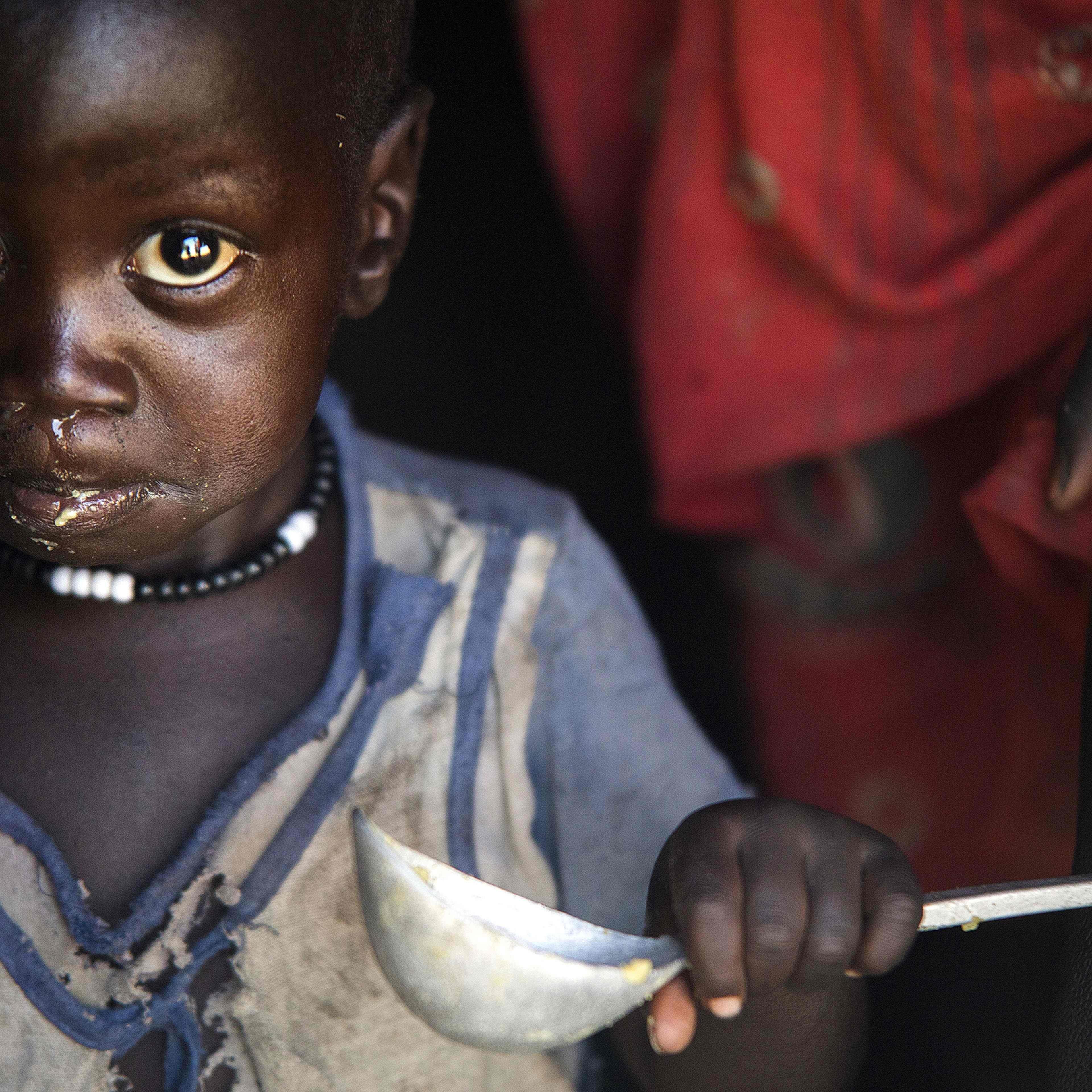 man-climate-change-humanitarian-crisis