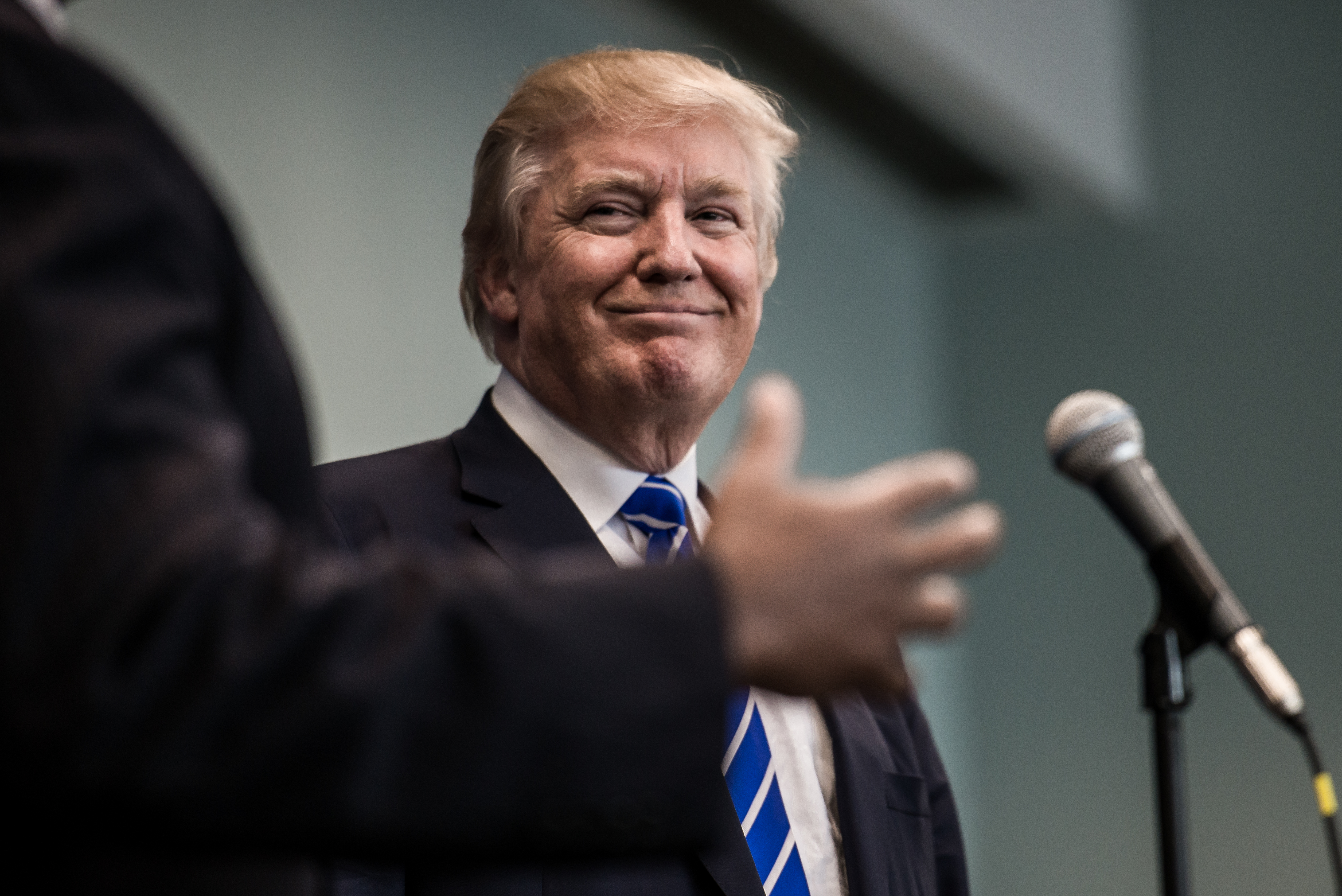 Donald Trump speaks to the media before a campaign event in Columbia, S.C. on Sept. 23, 2015.