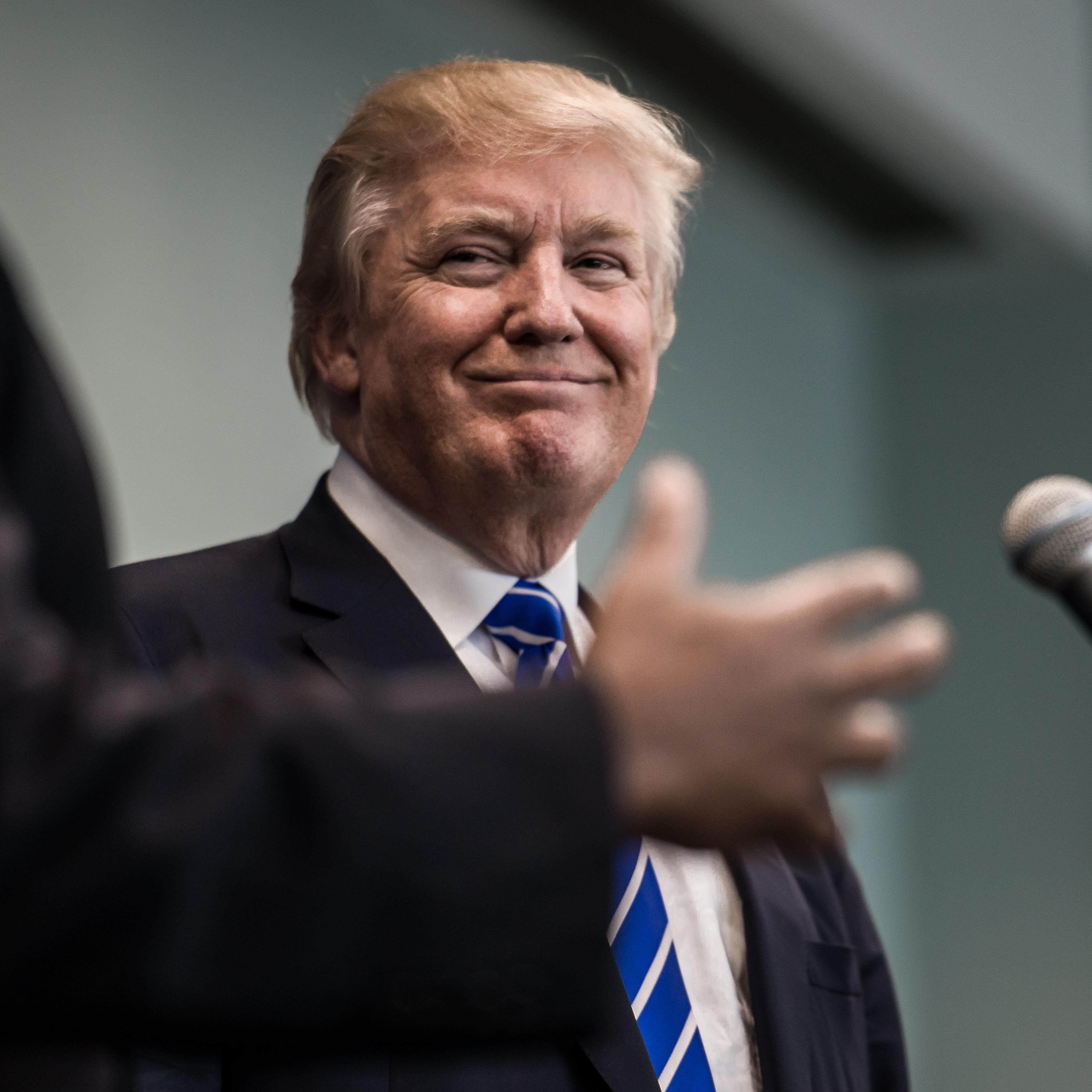Donald Trump speaks to the media before a campaign event in Columbia, S.C. on Sept. 23, 2015.