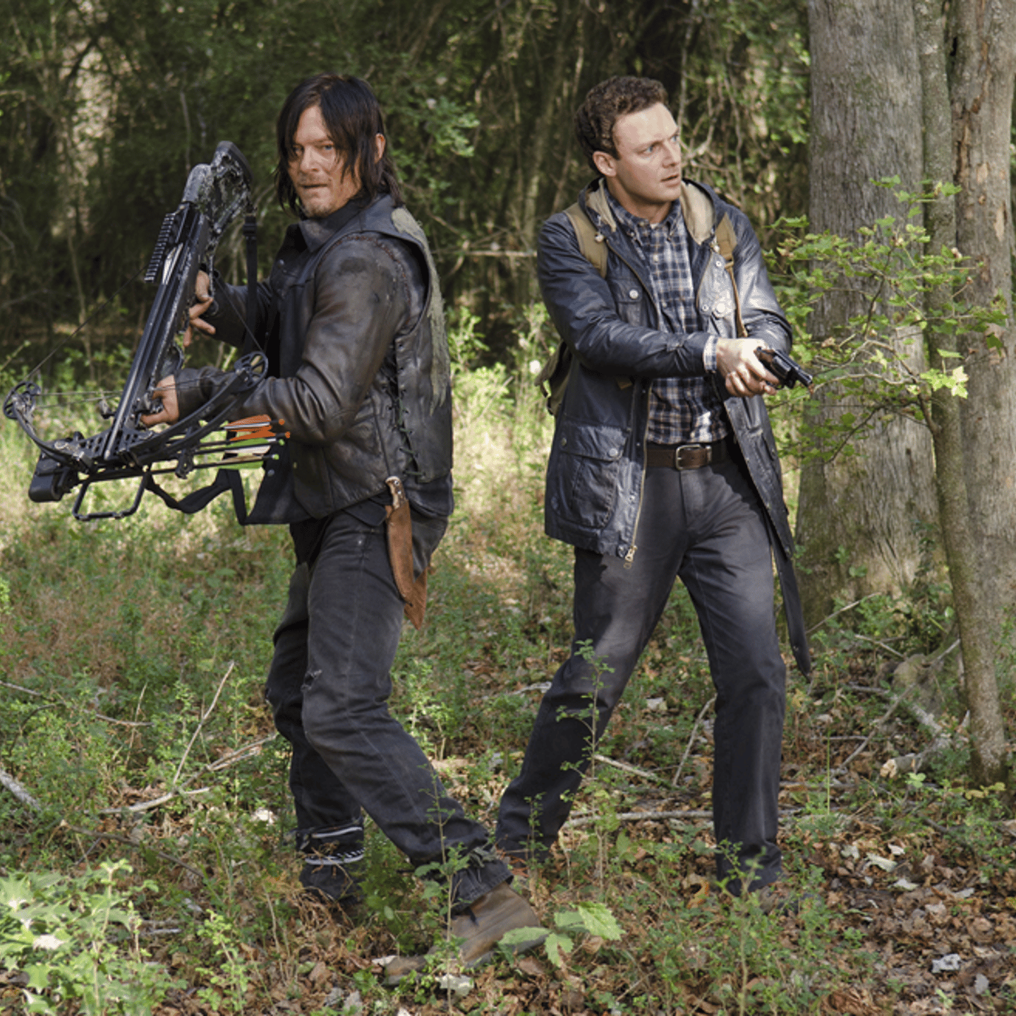 Norman Reedus (L) and Ross Marquand (R) in episode 15 of AMC's 'Walking Dead.'