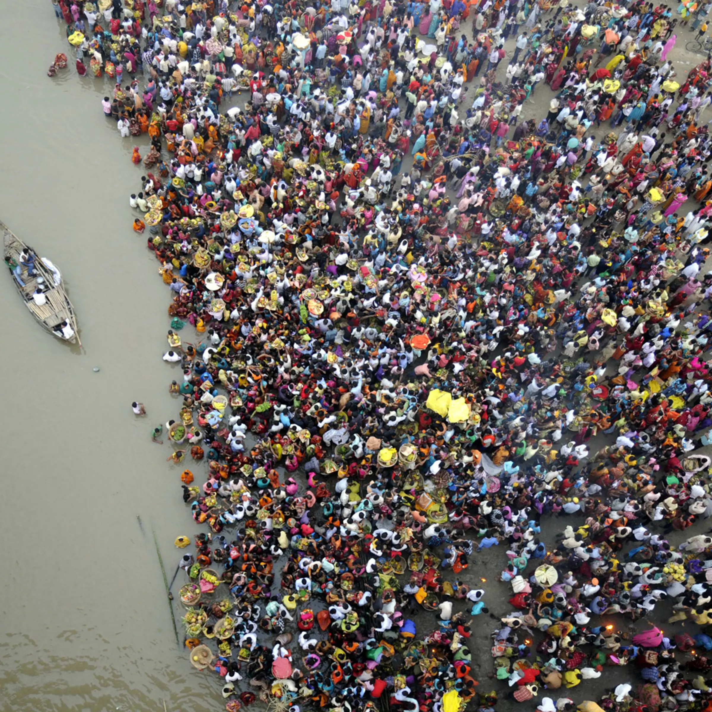 November 1, 2011. Hindu devotees in the Indian state of Bihar wade into the Ganges during an annual festival honoring the sun deity.