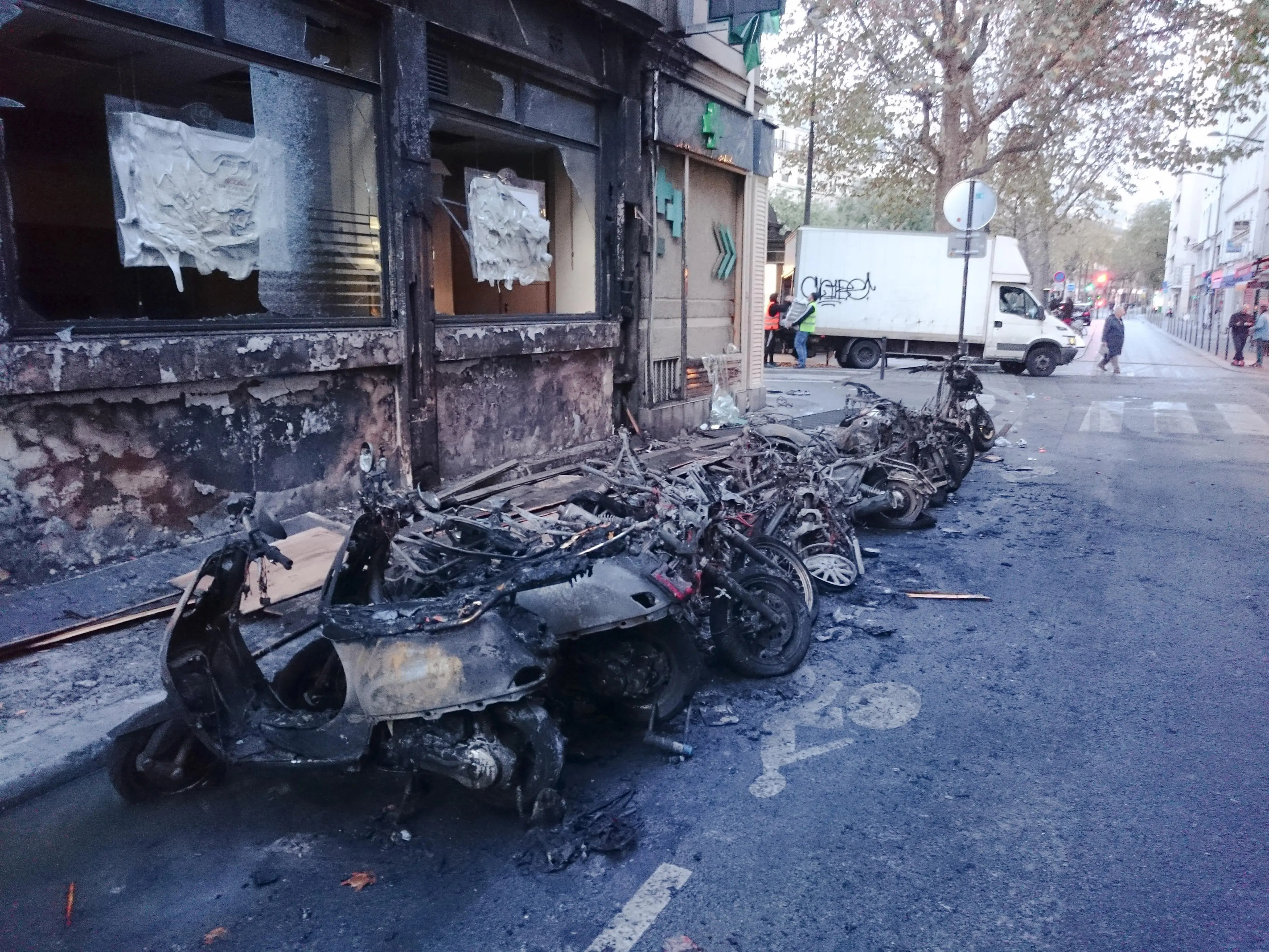 Dozens of burnt motorbikes and bikes are pictured on the corner of Albert Thomas Lancry streets, in the 10th arrondissement of Paris, on November 14, 2015, few hours after a series of terror attacks that occurred across the city. ©MAXIME JOUY/NEWZULU/Al