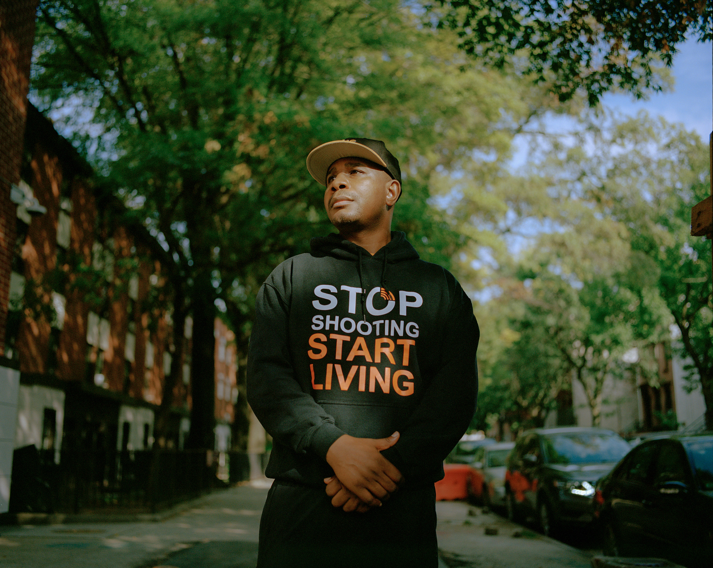 Rahson Johnson poses for a portrait near the S.O.S. offices in the Bed-Stuy neighborhood in Brooklyn, New York on October 8, 2021.