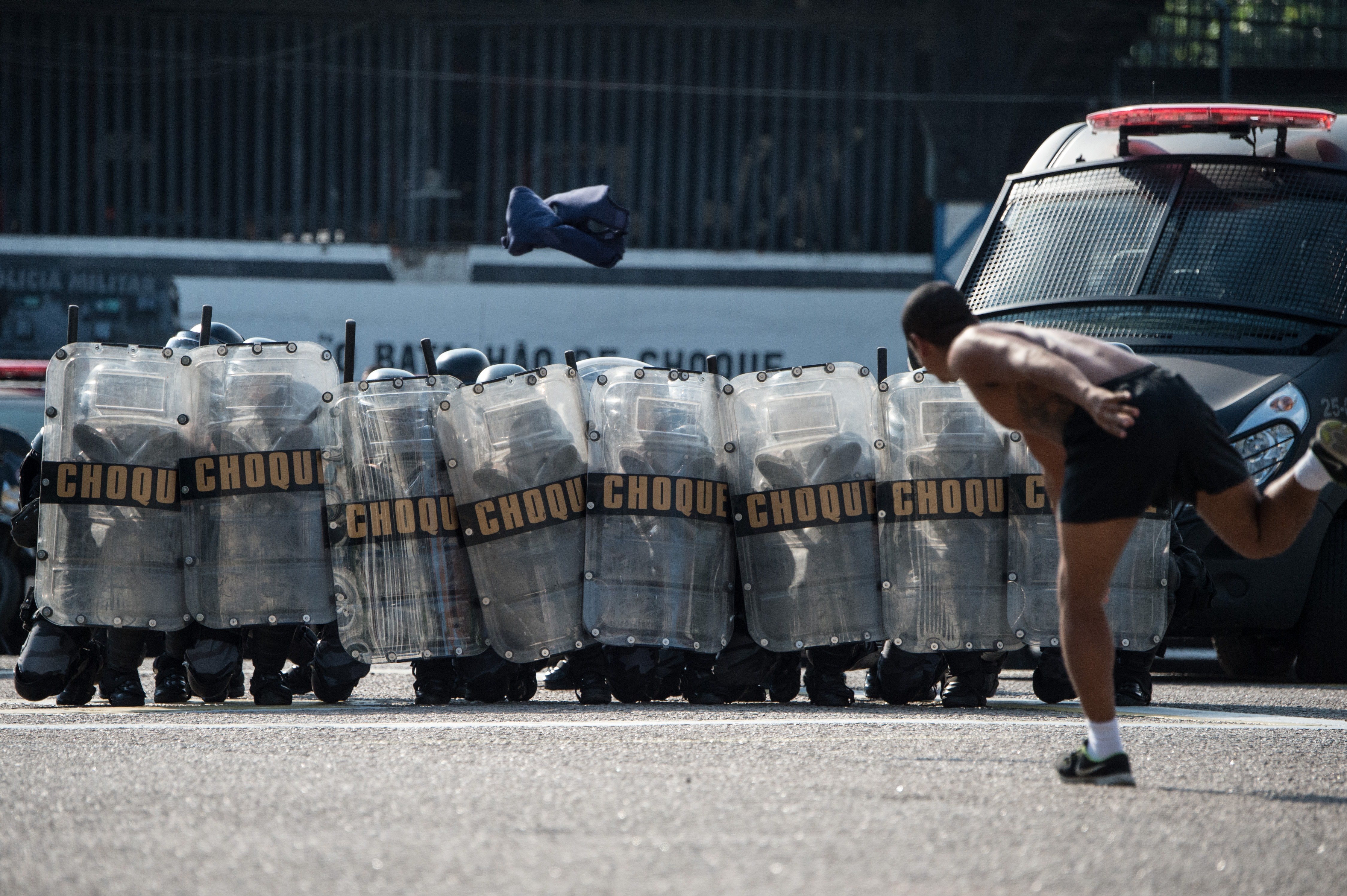The Special Riot Police unit (CHOQUE) carries out a drill for controlling civil disorders, at their headquarters in Rio de Janeiro, Brazil, on May 15, 2014.