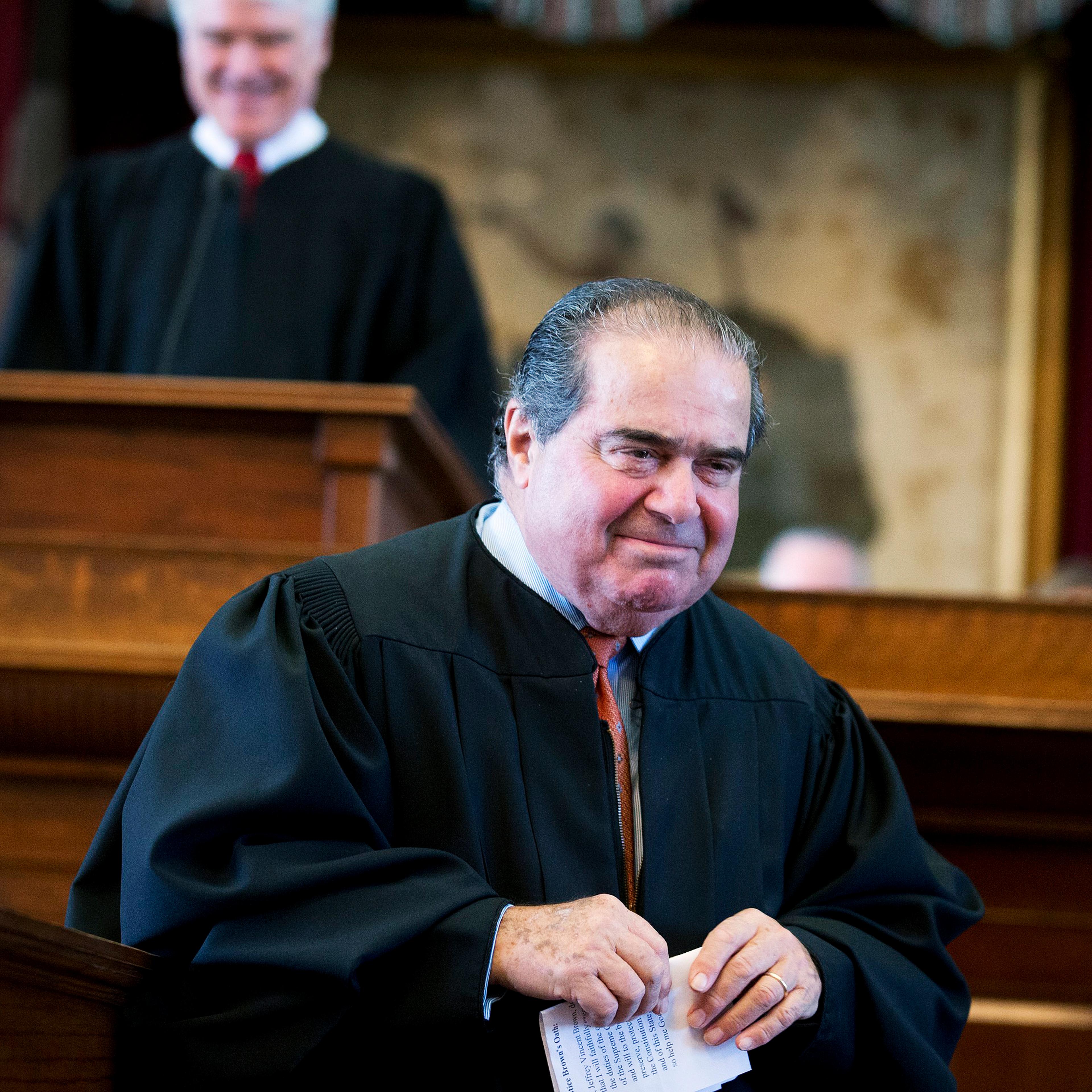 This Nov. 12, 2013 photo shows Supreme Court Justice Antonin Scalia during the investiture of Texas Supreme Court Chief Justice Nathan Hecht at the Texas Capitol in Austin.