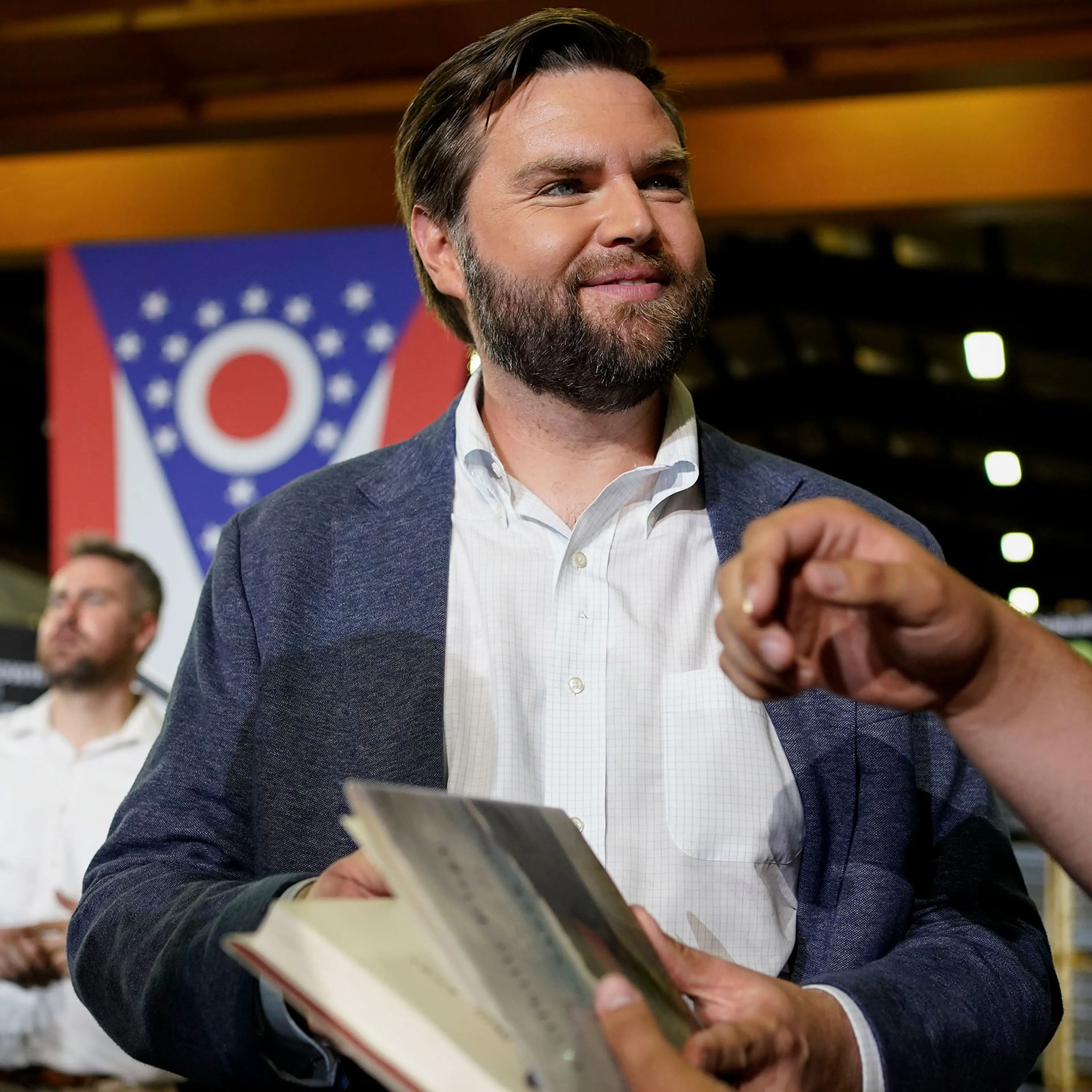 JD Vance, the venture capitalist and author of "Hillbilly Elegy," speaks with supporters after a rally in Middletown, Ohio, on July 1, 2021.