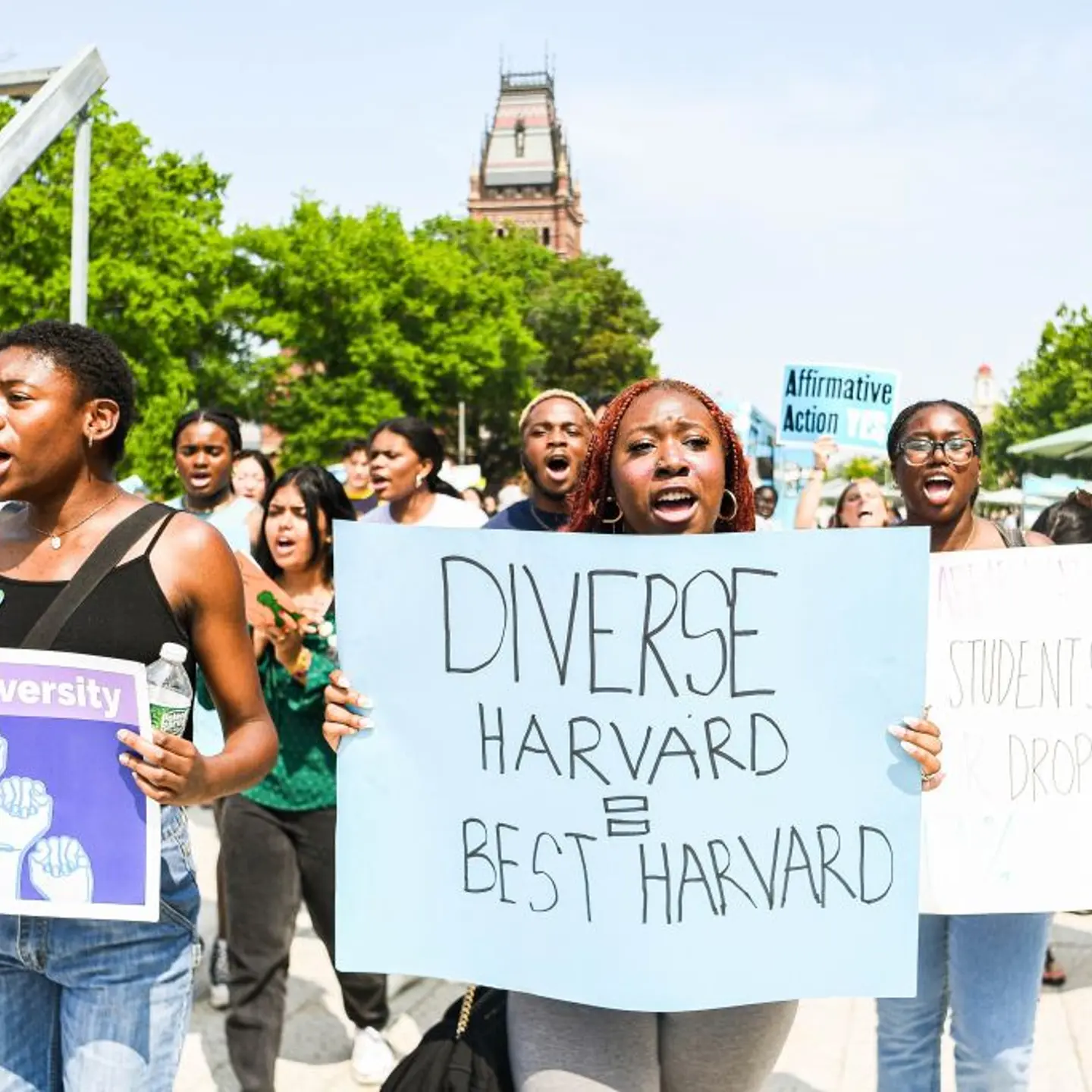 Participants march and chant slogans at a rally protesting the Supreme Court's ruling against affirmative action on Harvard University Campus in Cambridge, Mass., on July 1, 2023.