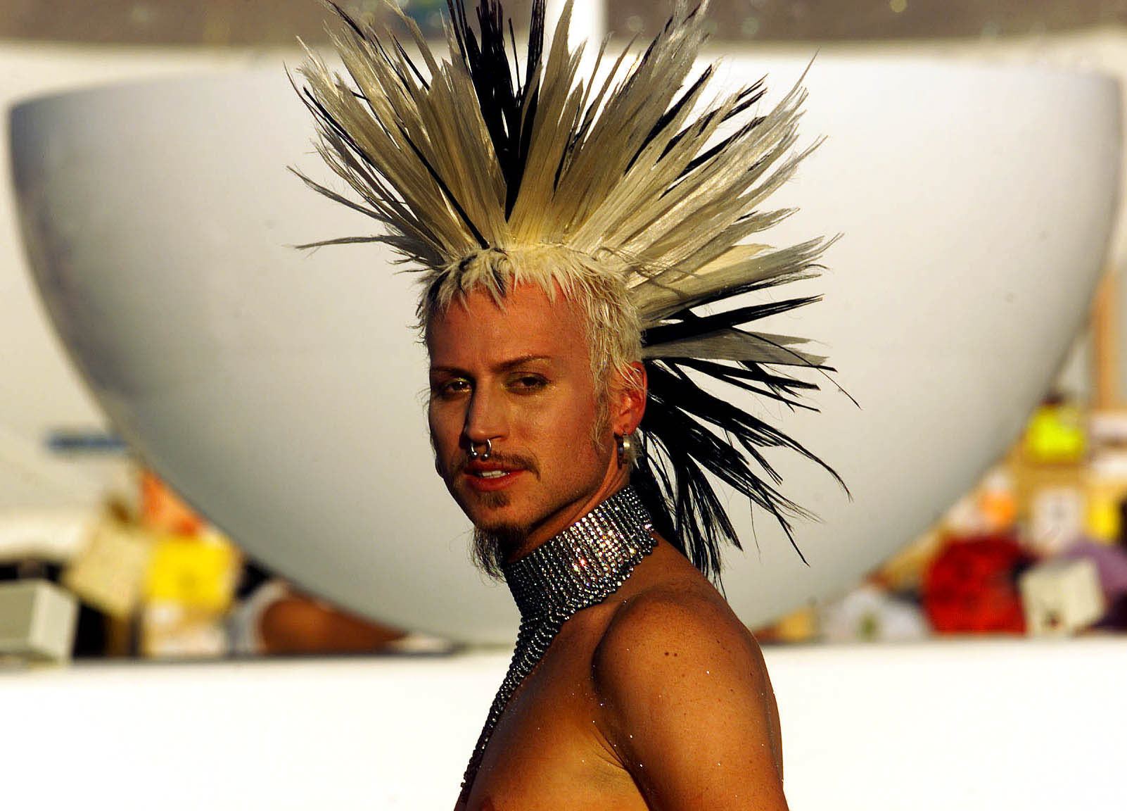 A man poses at Black Rock City's Burning Man festi