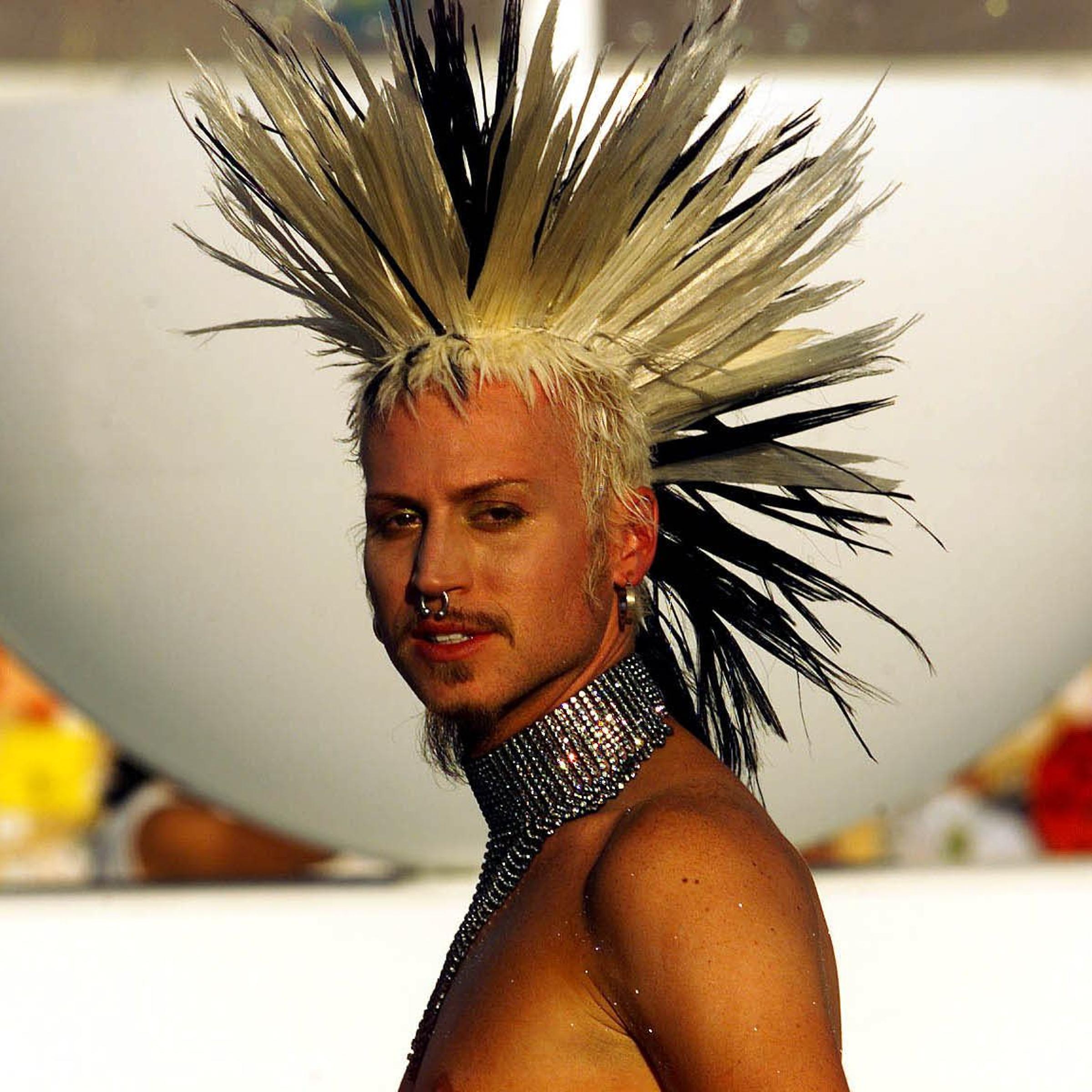 A man poses at Black Rock City's Burning Man festi