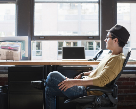 startup-man-sitting-side-view
