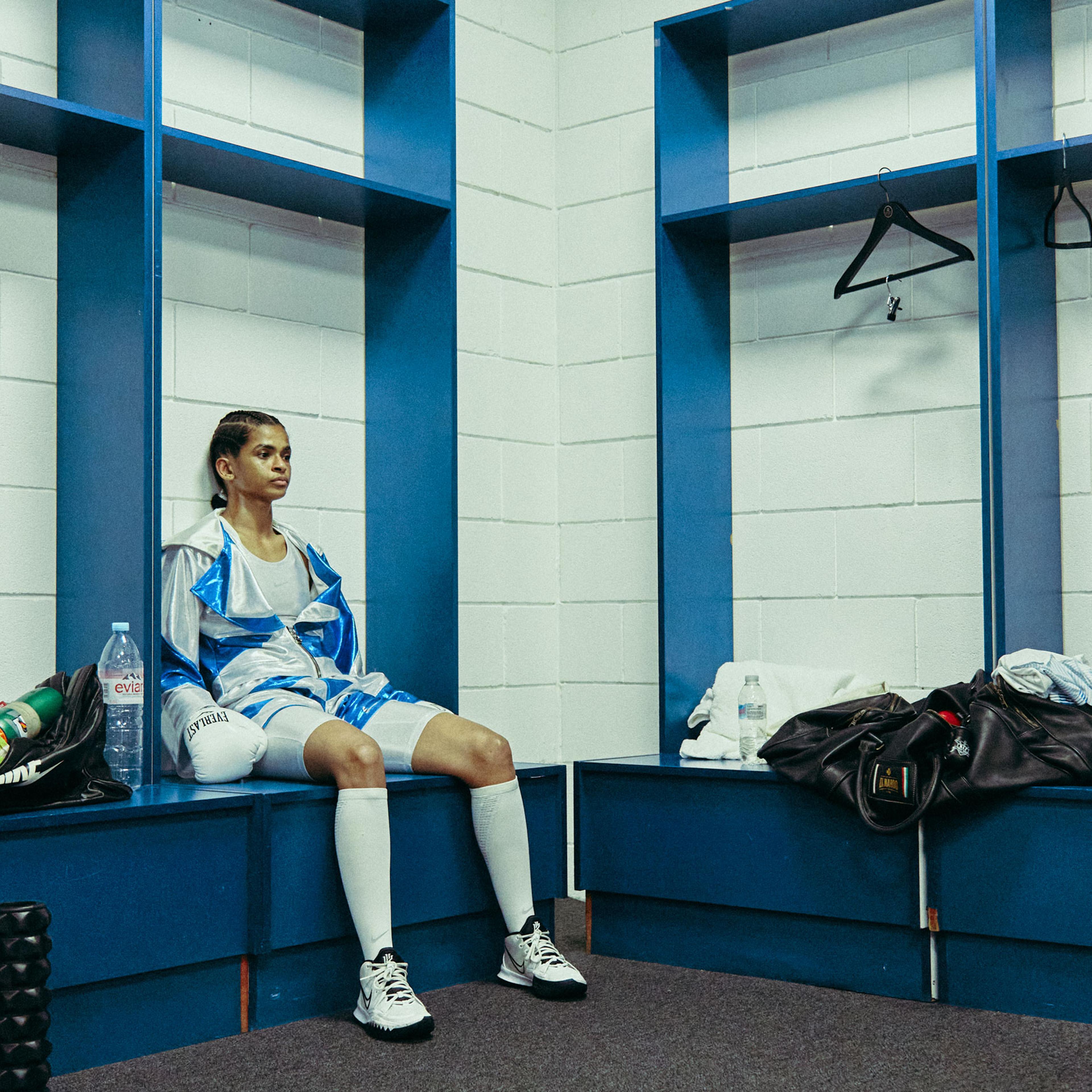 Ramla Ali seated in a locker room on fight night