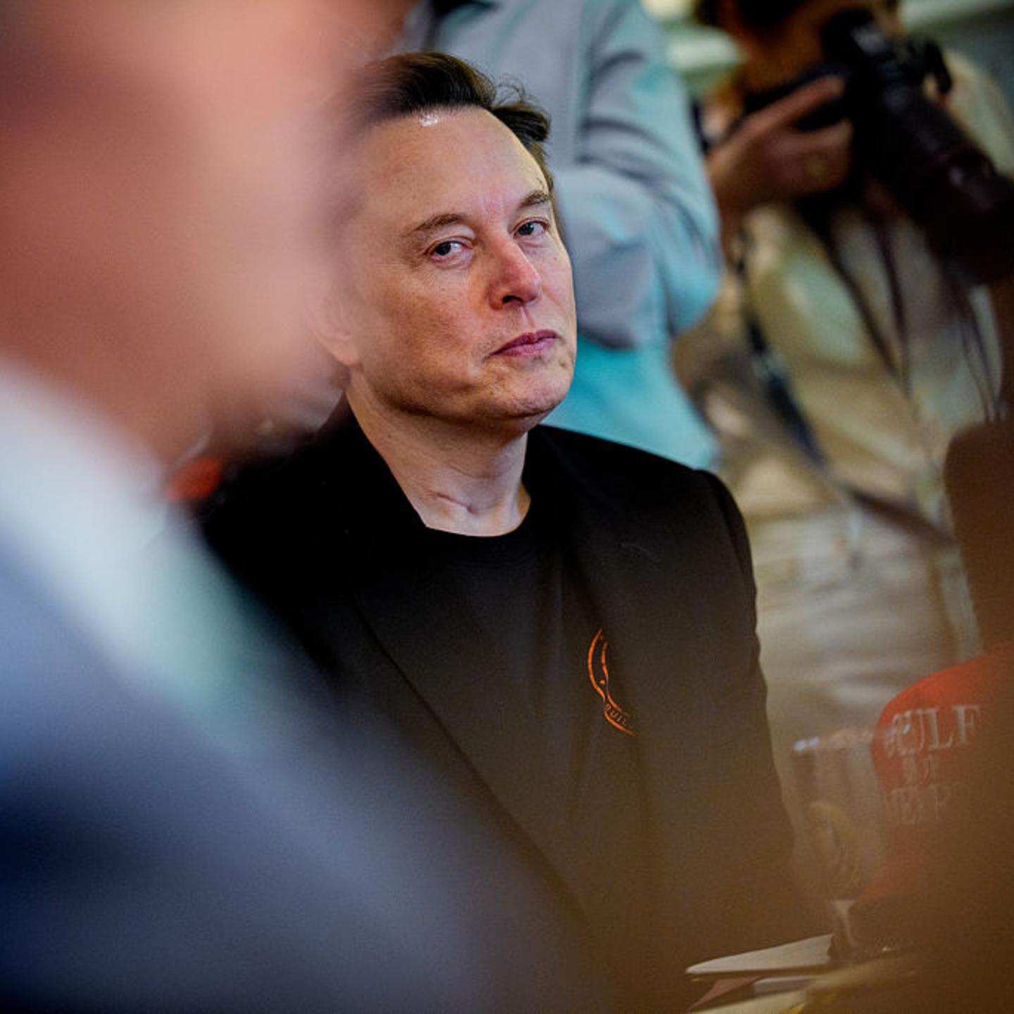 Tesla CEO Elon Musk looks on during a Cabinet meeting at the White House in Washington, D.C. on April 30, 2025.