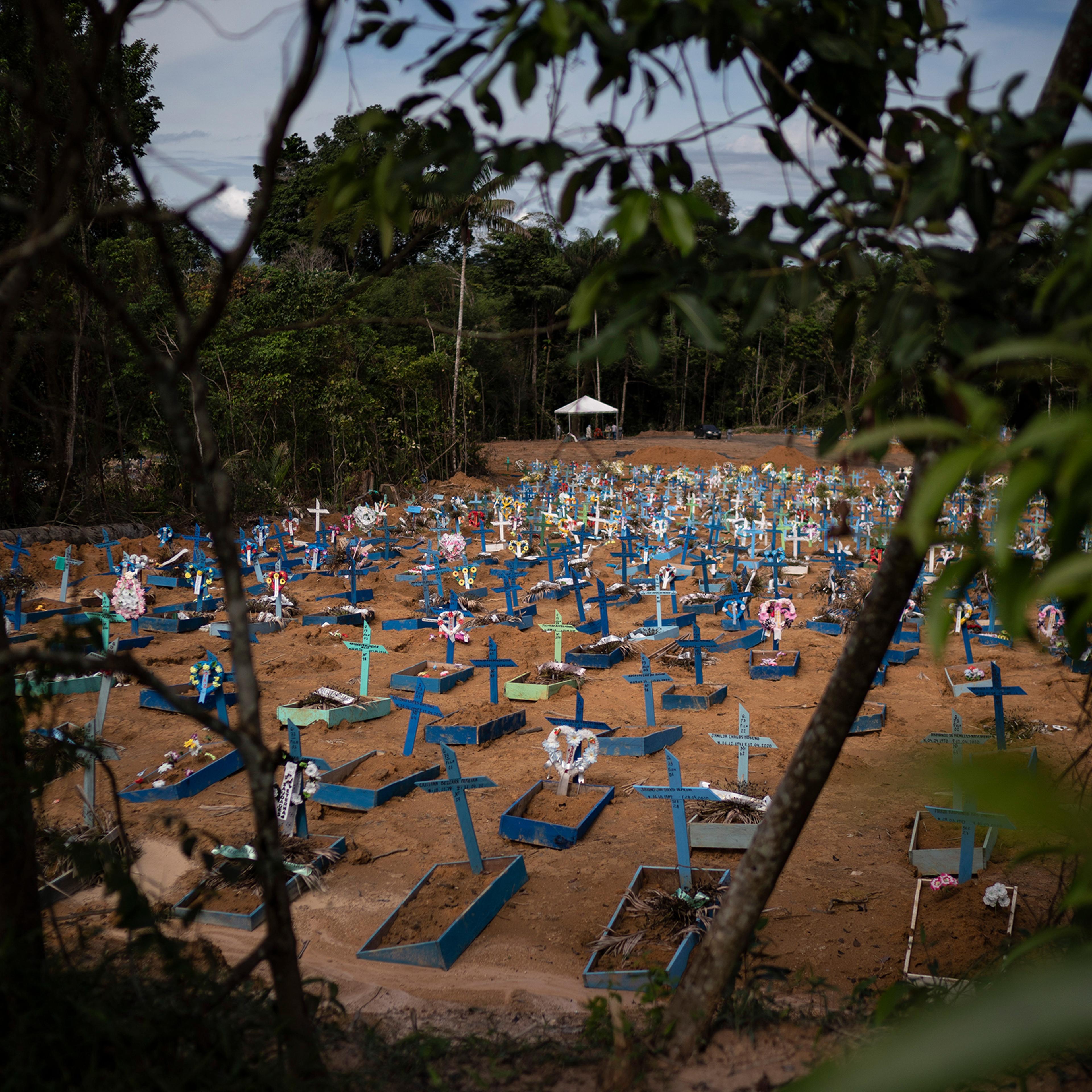 Graves of people who died in the past 30 days fill a new section of the Nossa Senhora Aparecida cemetery in Manaus, Brazil, on May 11, 2020. The new section was opened last month to cope with a sudden surge in deaths.