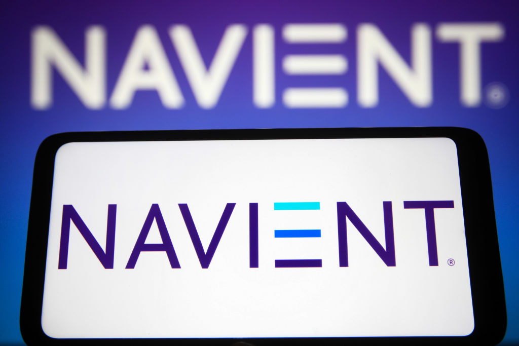 In this photo illustration, the Navient Corporation logo is