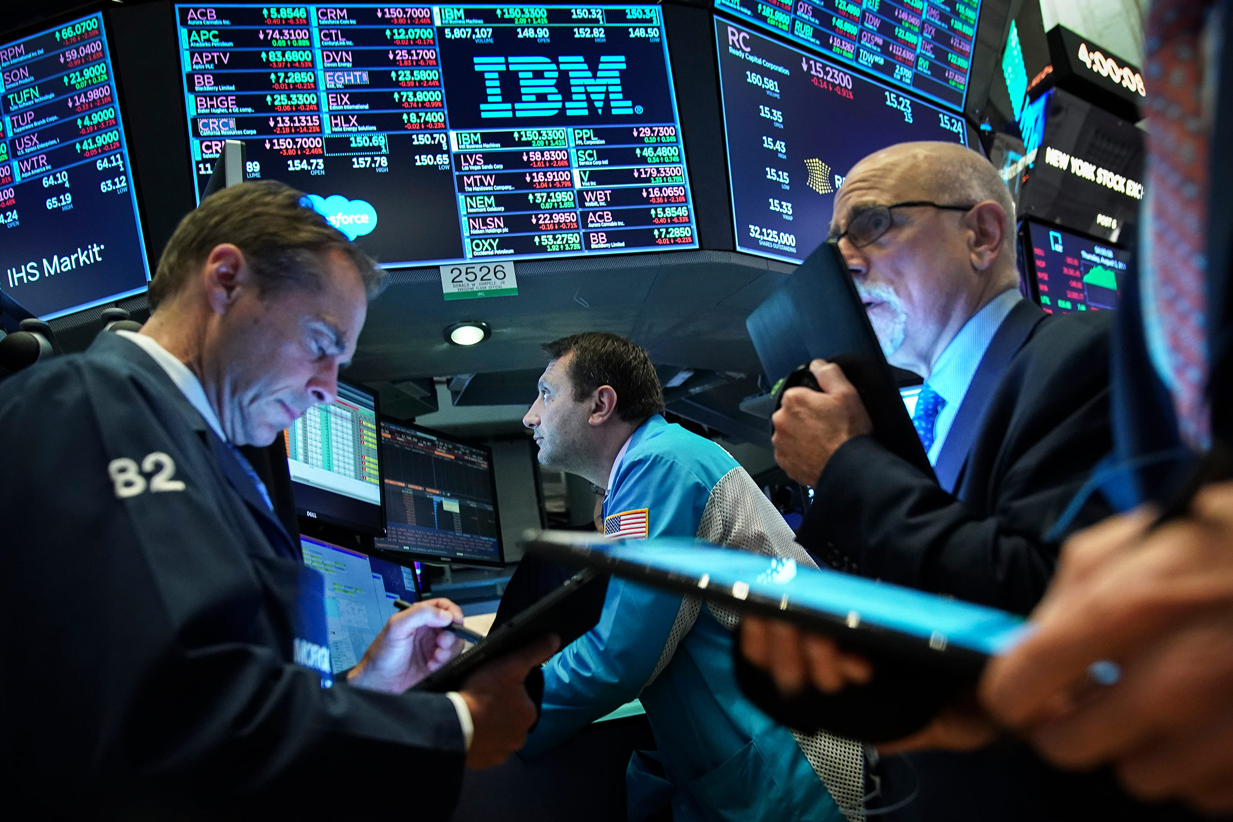 Traders and financial professionals work ahead of the closing bell on the floor of the New York Stock Exchange on Aug. 1, 2019 in New York City.