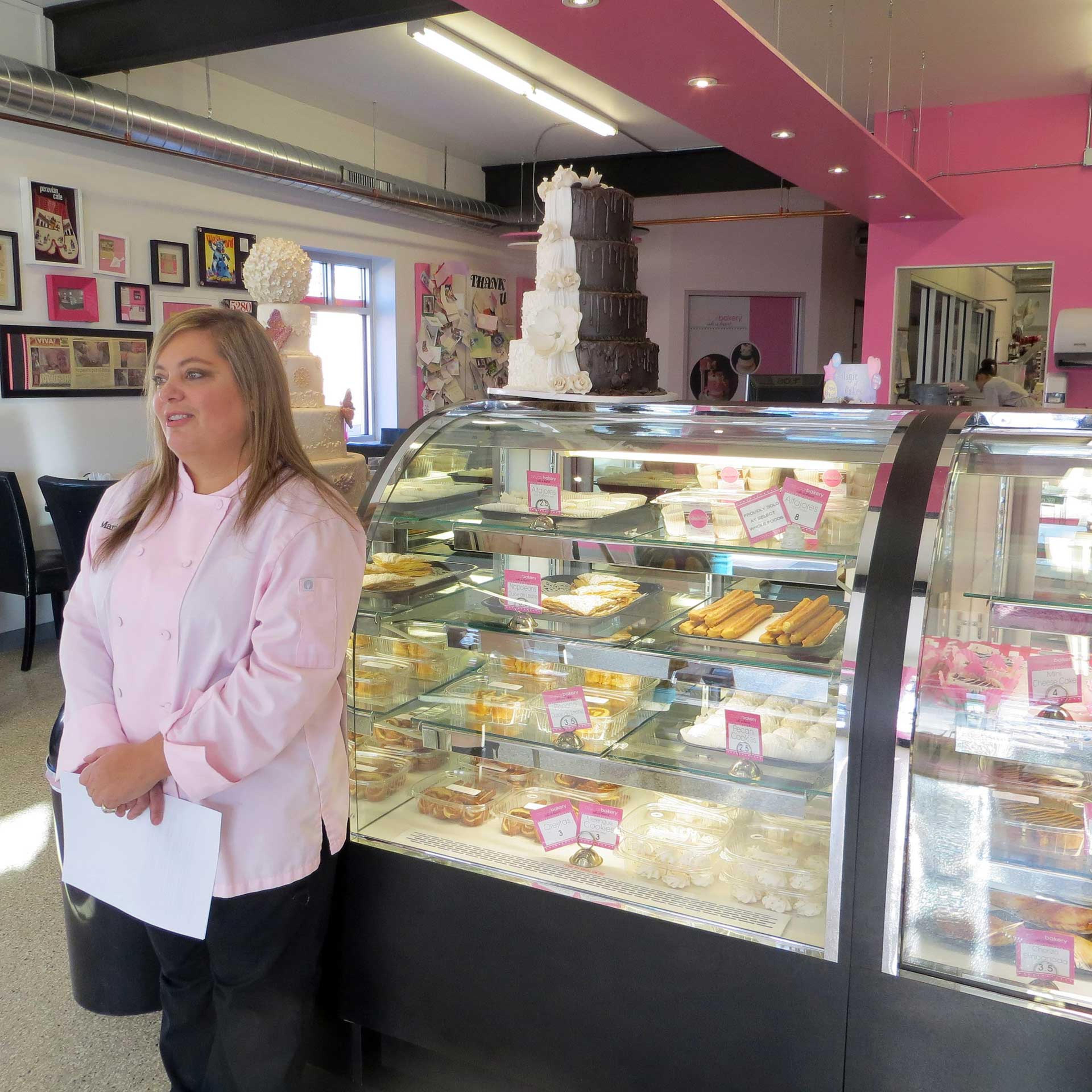 Bakery owner Marjorie Silva, who refused to write hateful words about gays on a cake for a customer, stands inside her own Azucar Bakery, in Denver, on Jan. 20, 2015.
