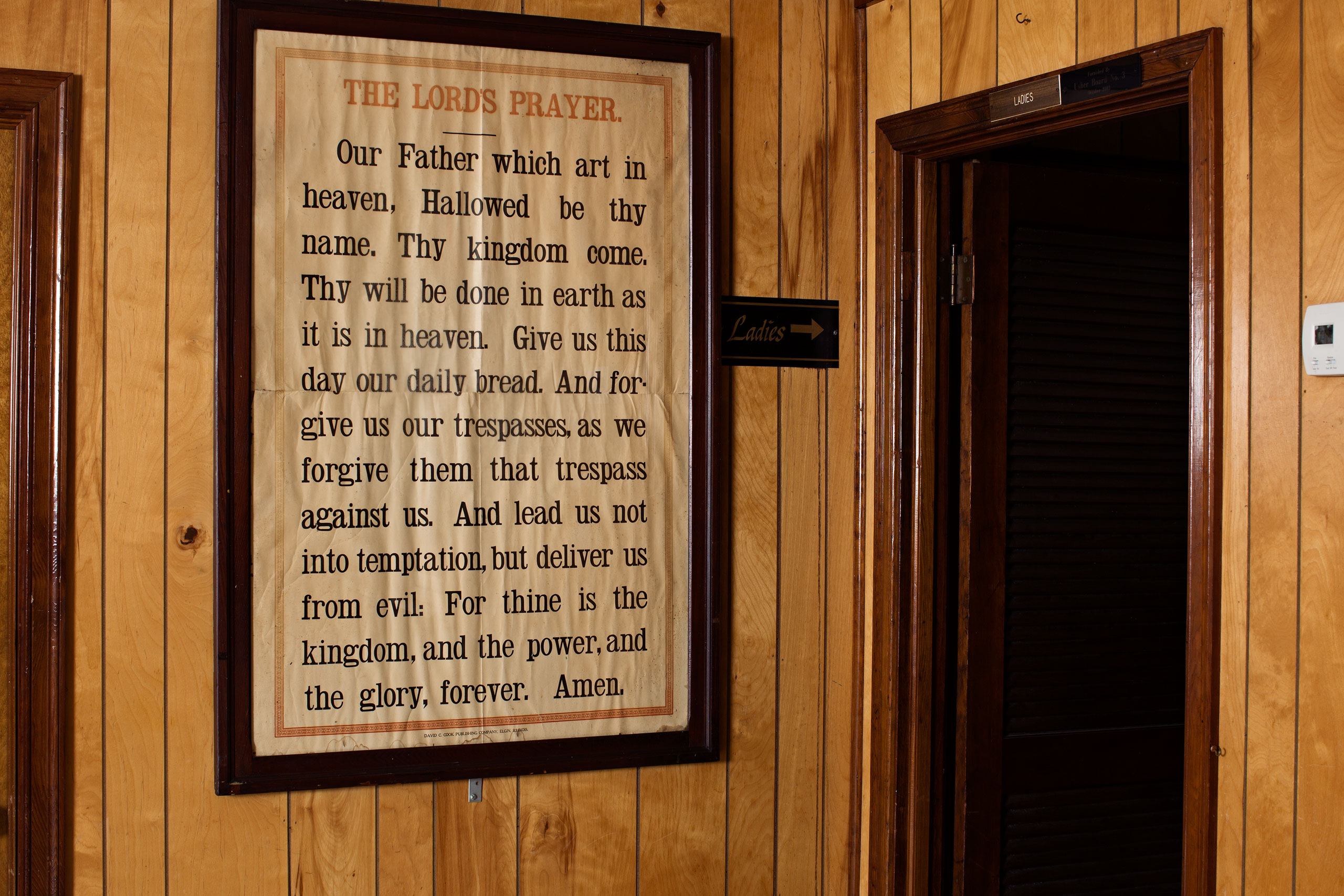 The Lord’s Prayer hangs on a wall inside Mother Emanuel